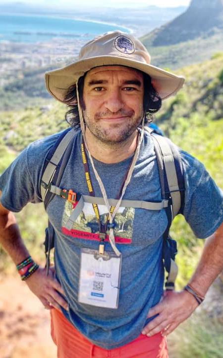 Man with climbing gear.