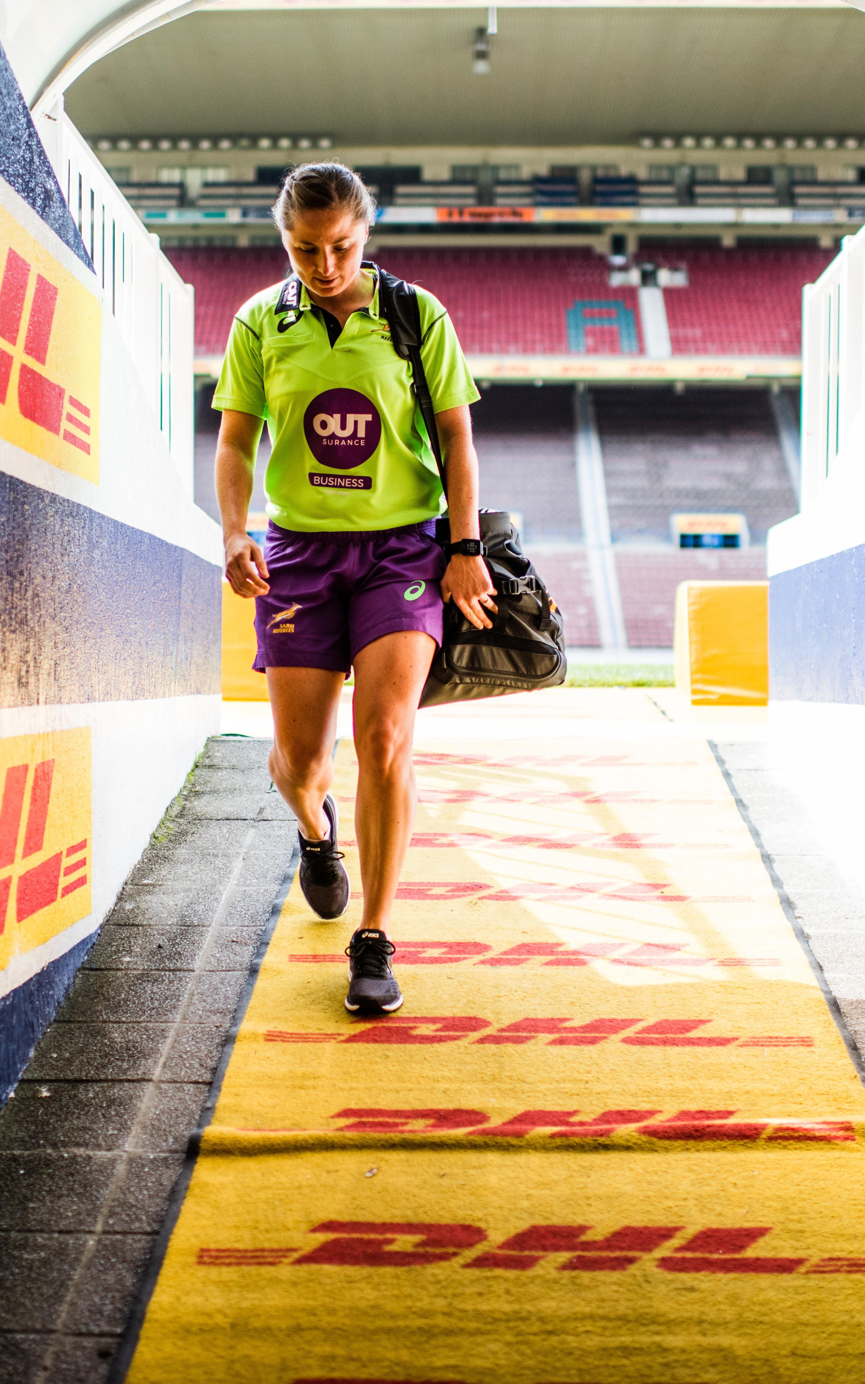 Boy exiting sport stadium