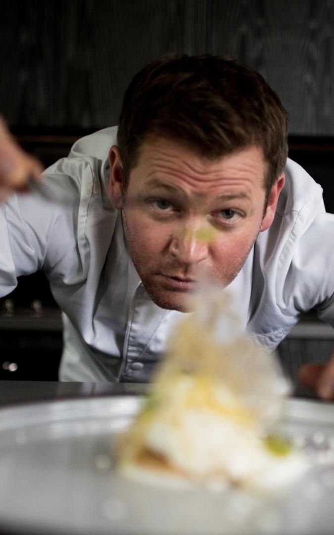 Chef plating up food