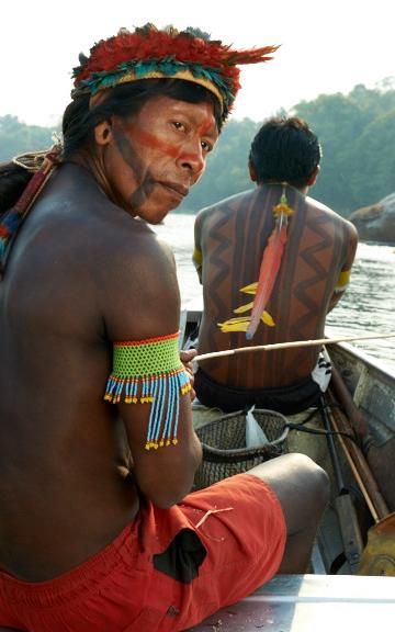 Beautiful News- Kayapó people canoeing down a river. 