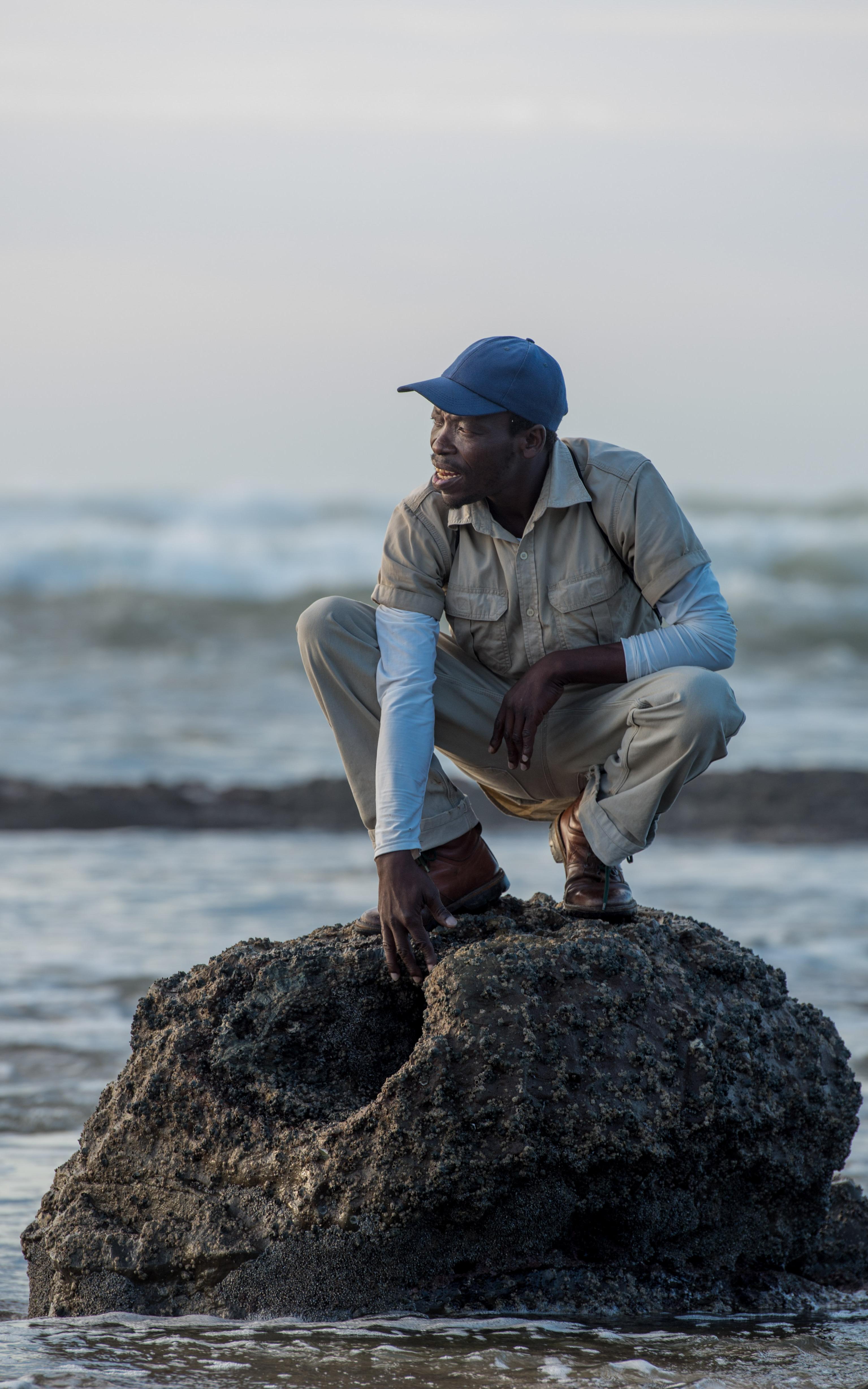 Man standing on rock