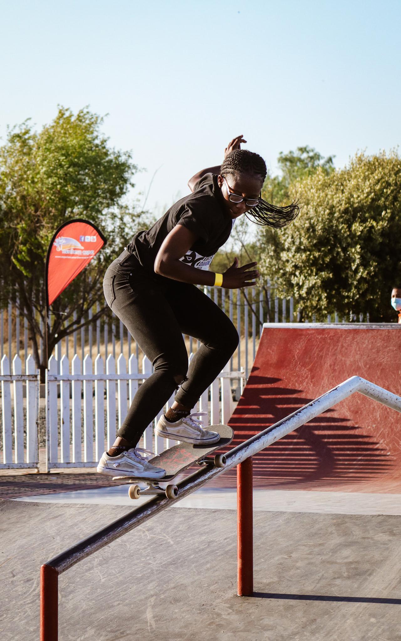 Beautiful News - Boipelo Awuah from Kimberley in Northern Cape South Africa skateboarding on a rail on a 