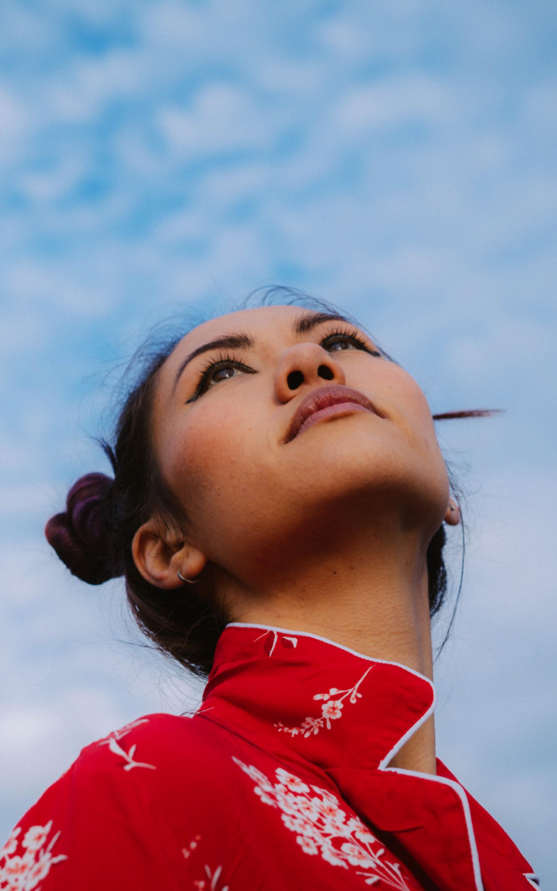 Woman looking up to the sky