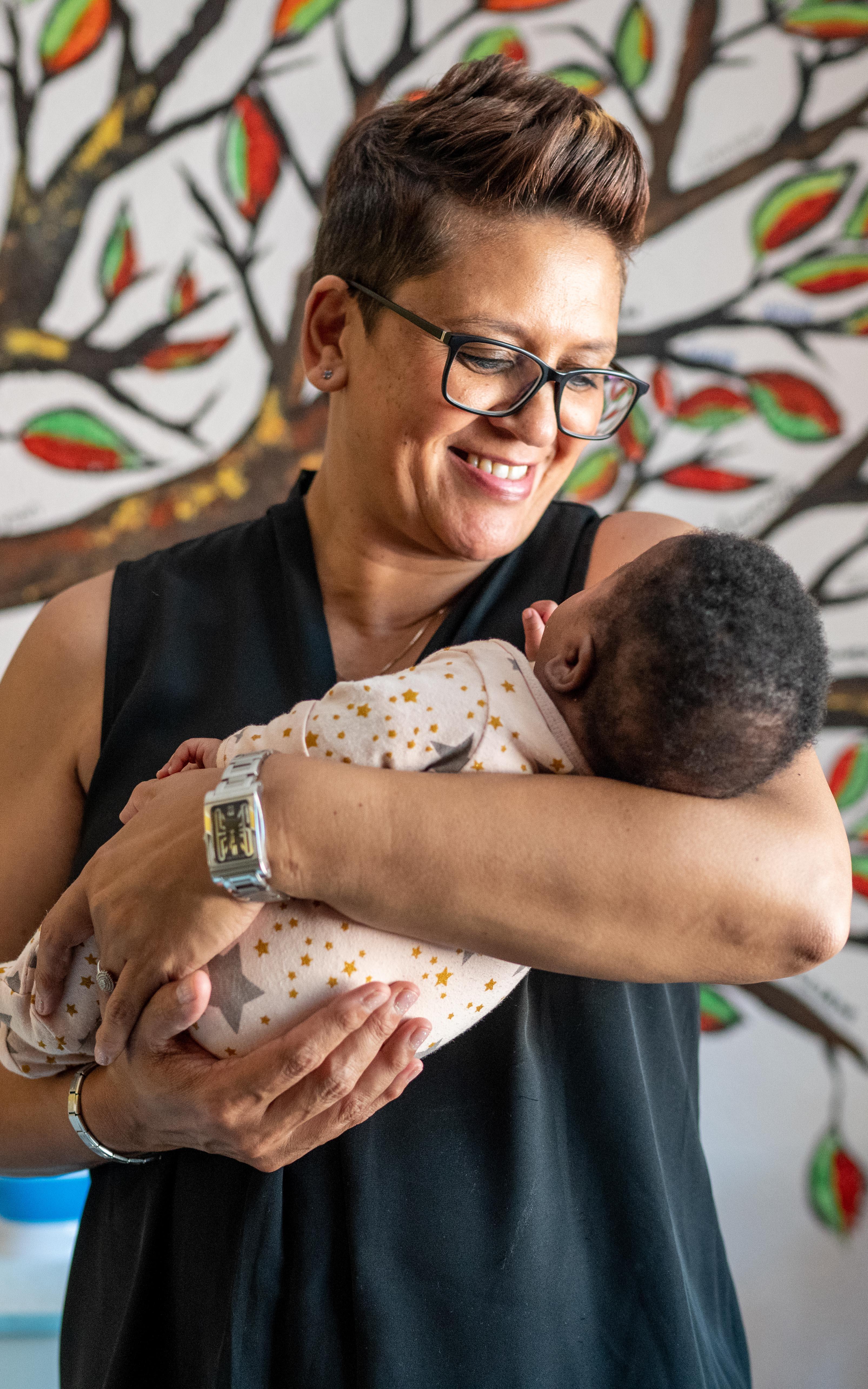 woman holding a baby