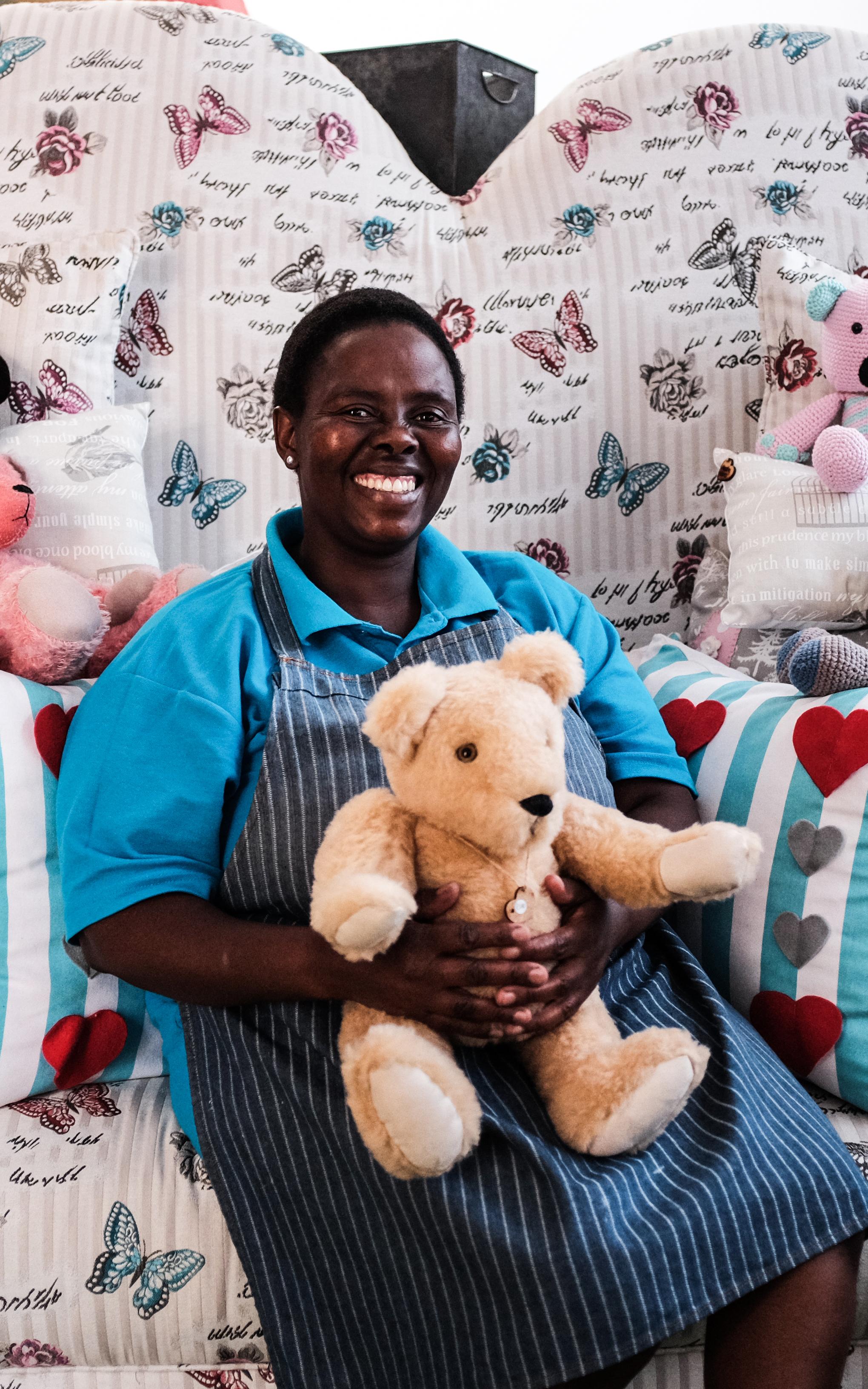 Lady Holding A Teddy Bear