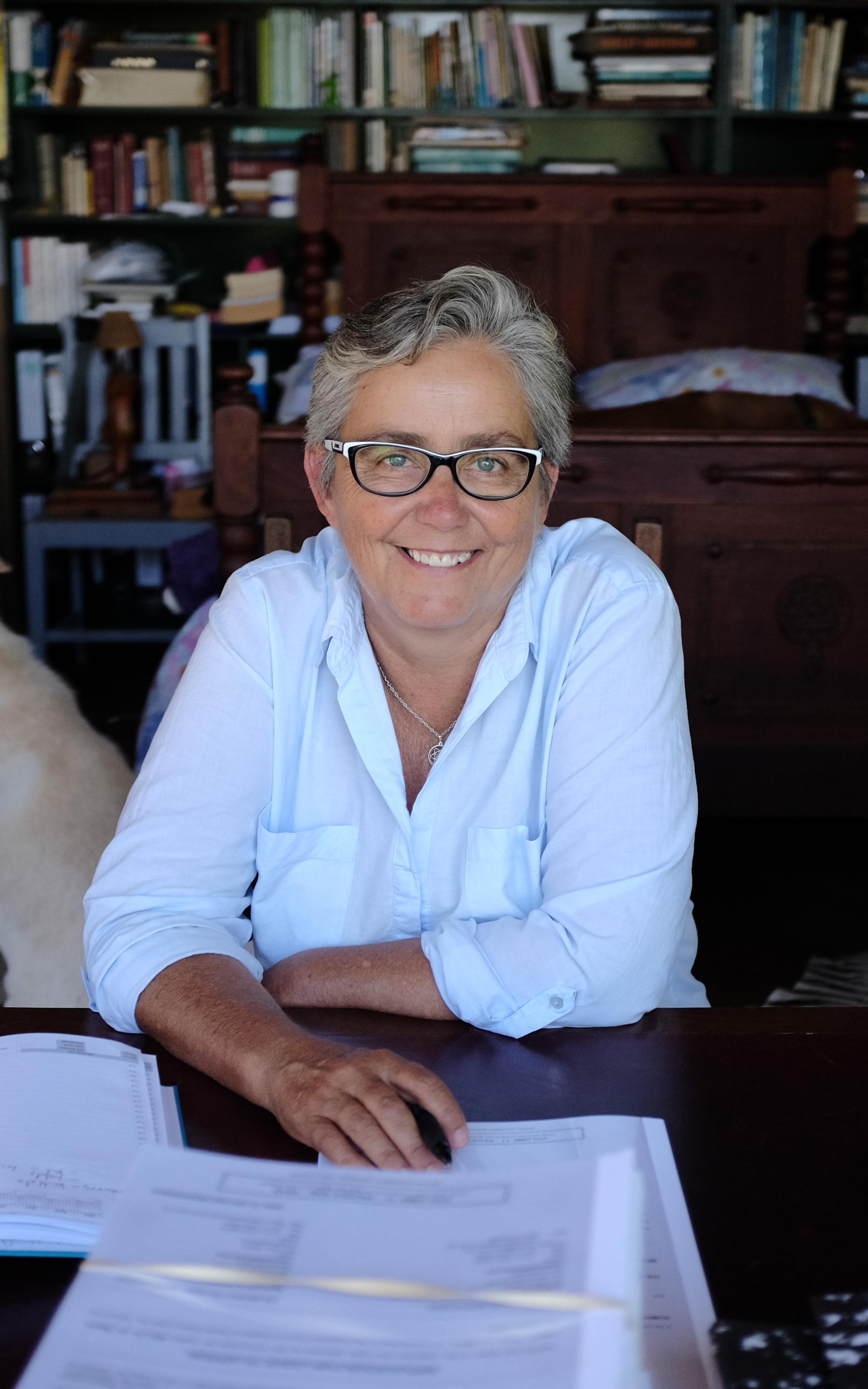 White woman at desk