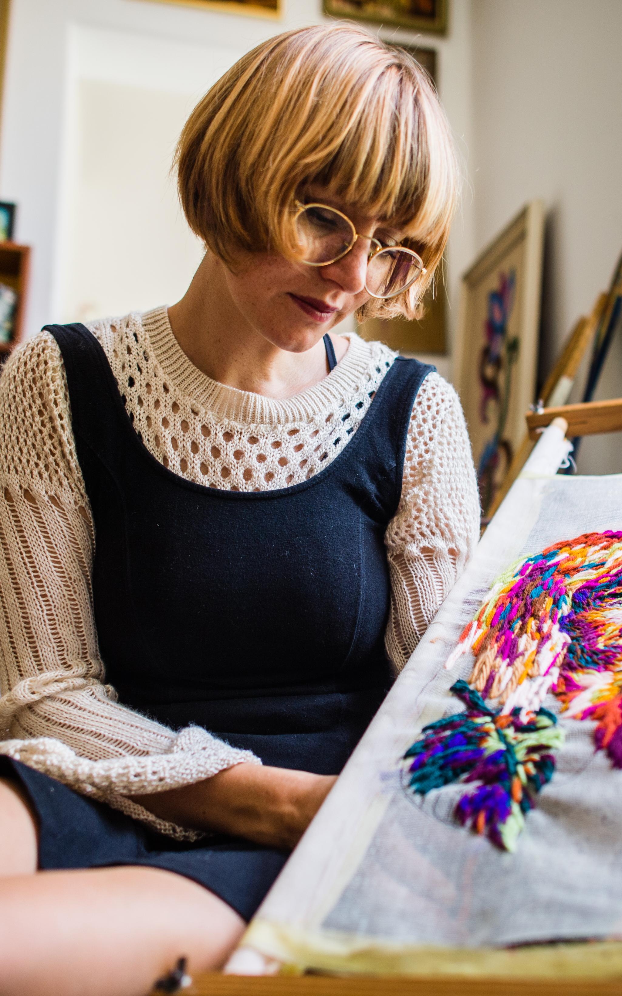 White woman knitting