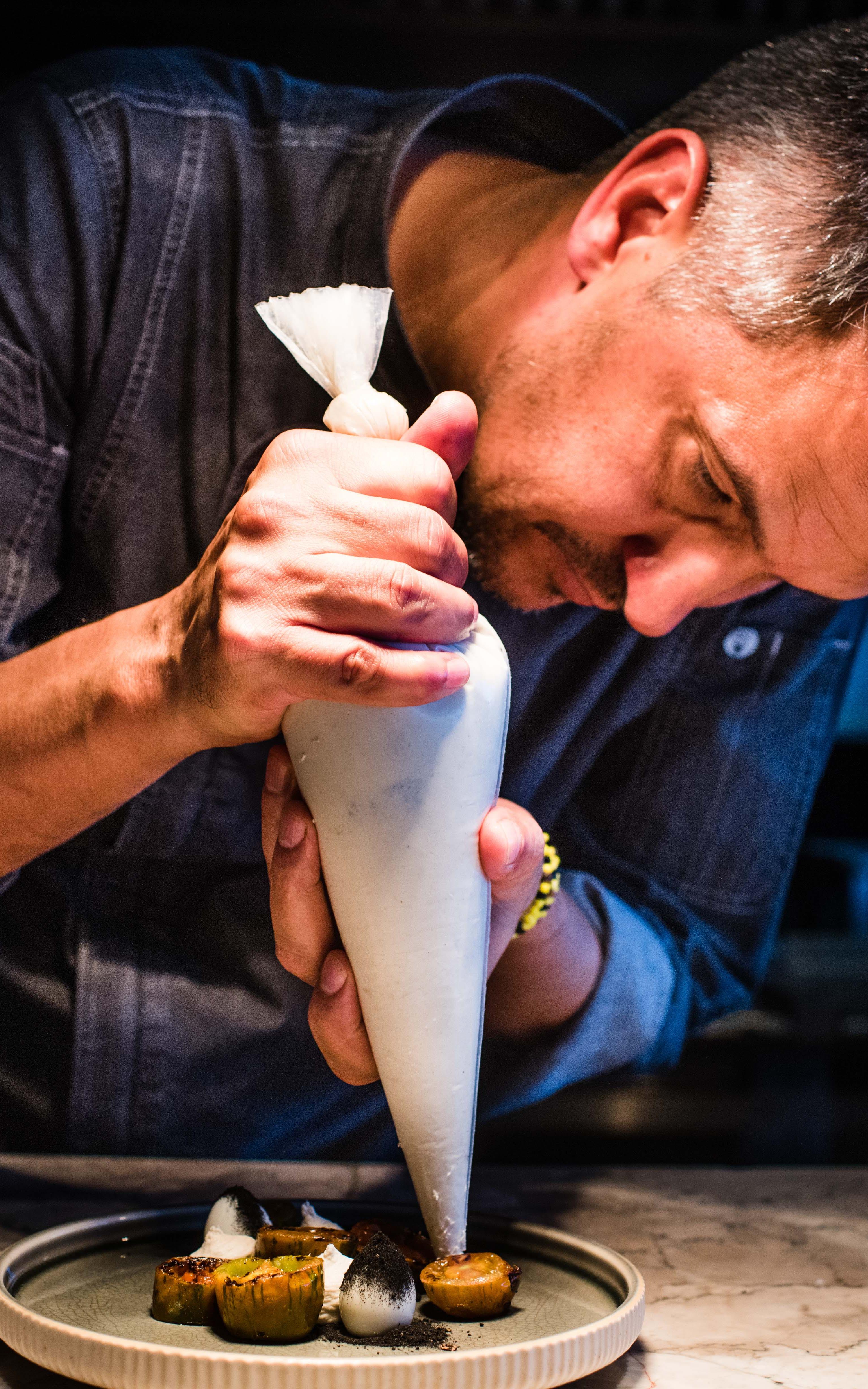 Chef with piping bag