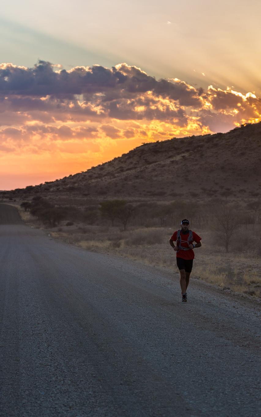 Man running during sunset