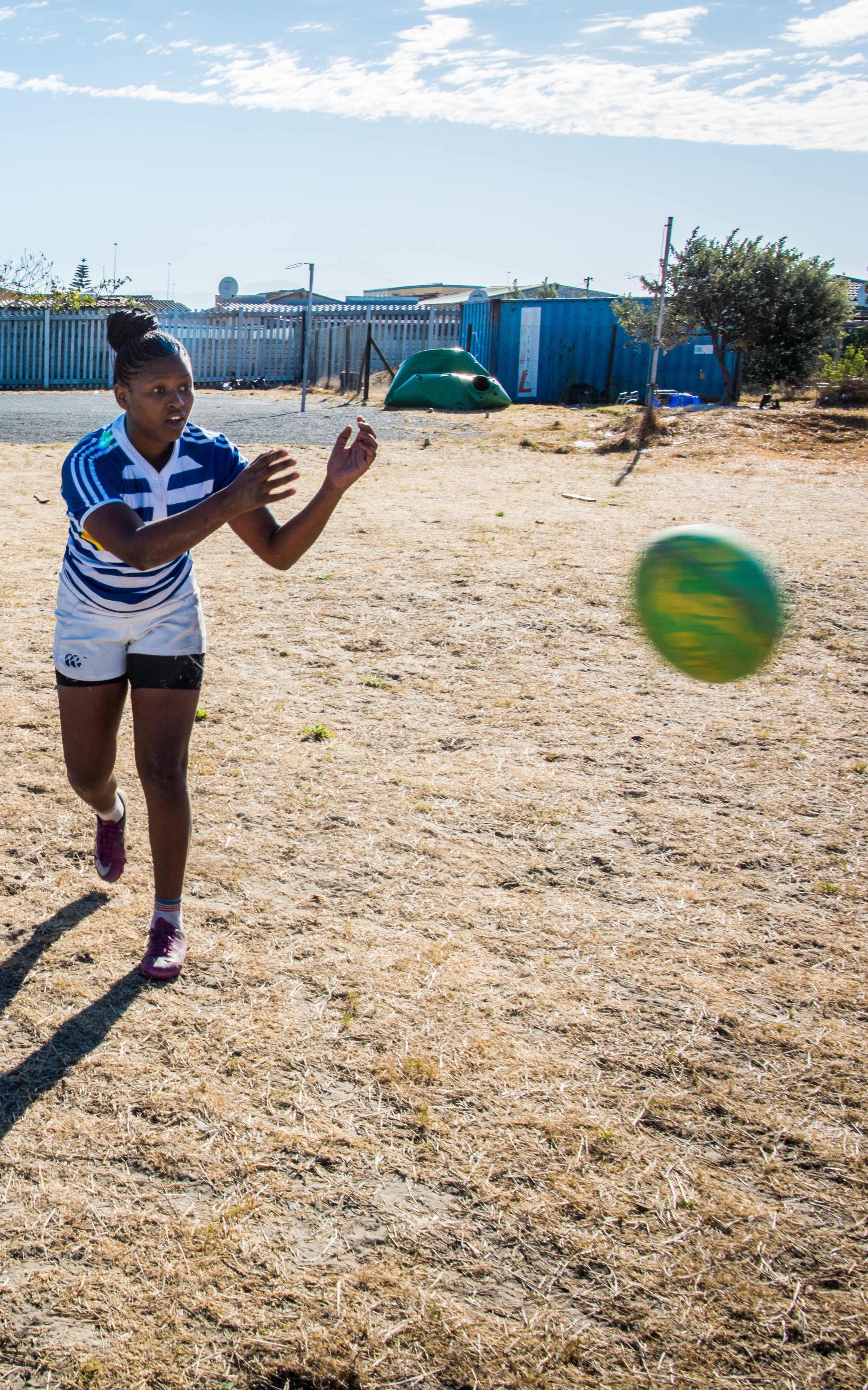 girls playing rugby