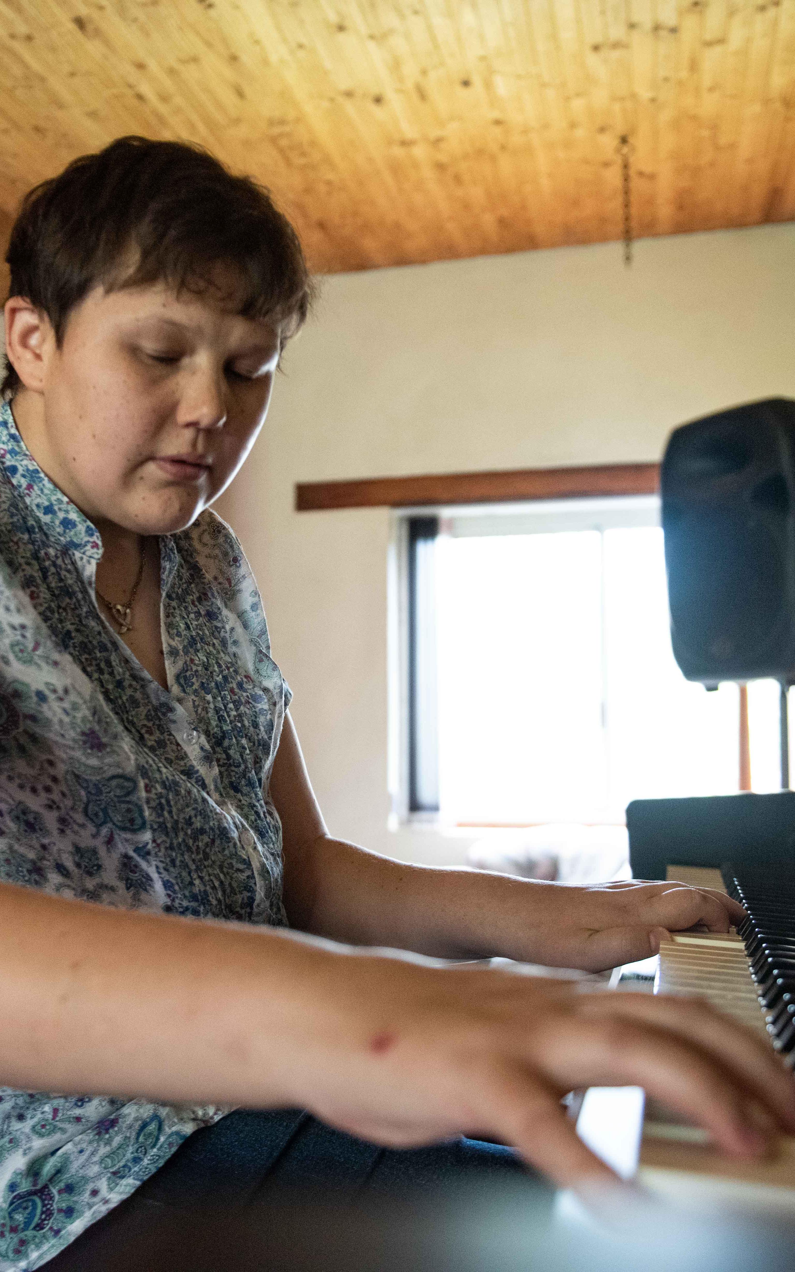 Blind woman playing piano