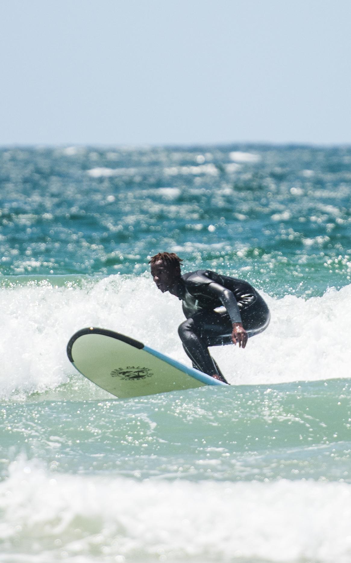 The surfer rising from rock bottom to ride the waves of his full potential