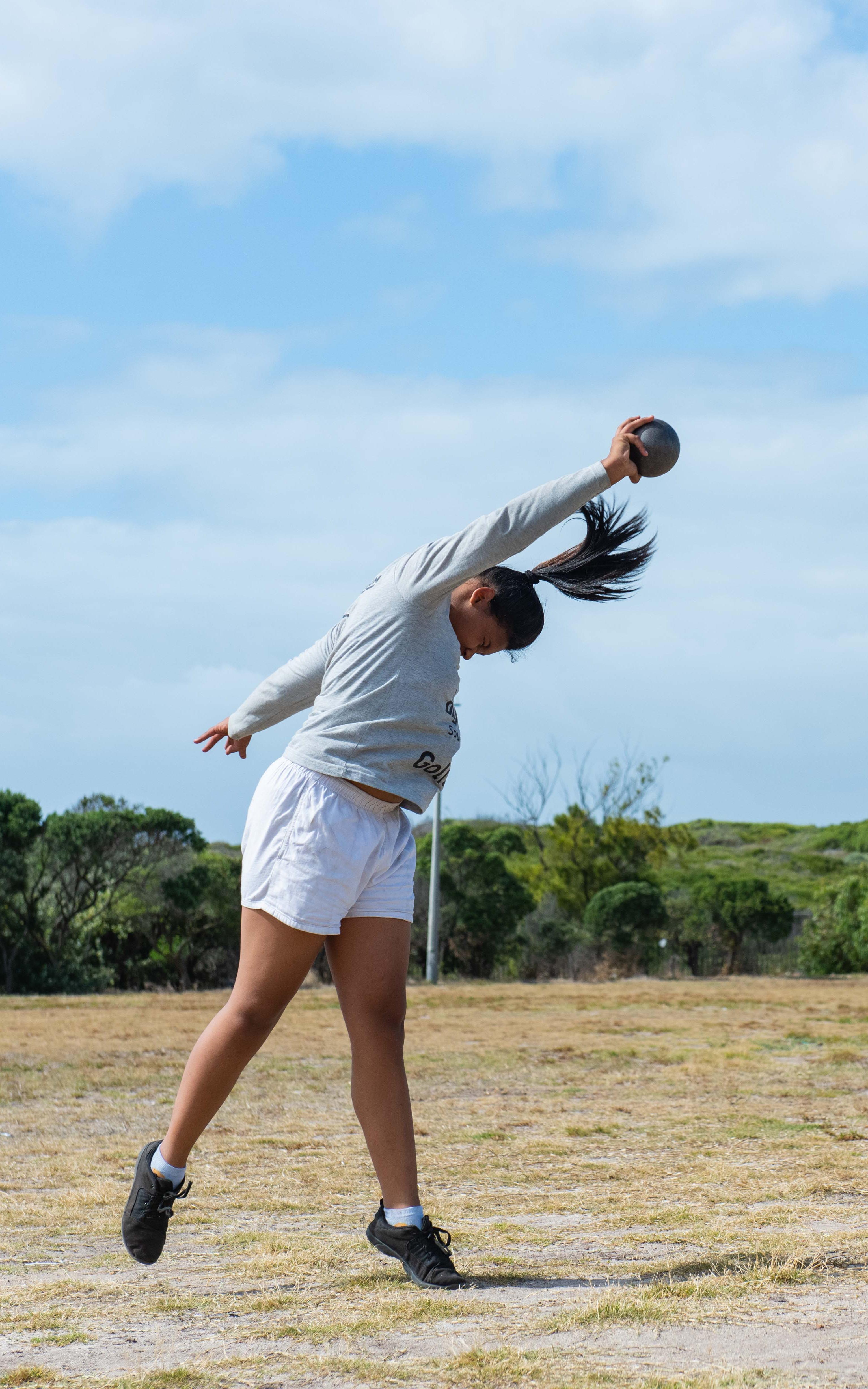 Girl playing shot put