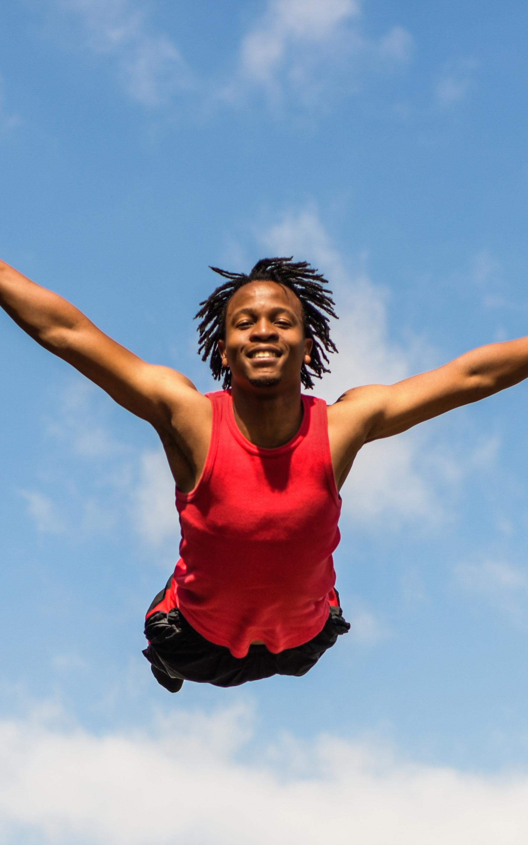 Trampoline gymnast in the air.
