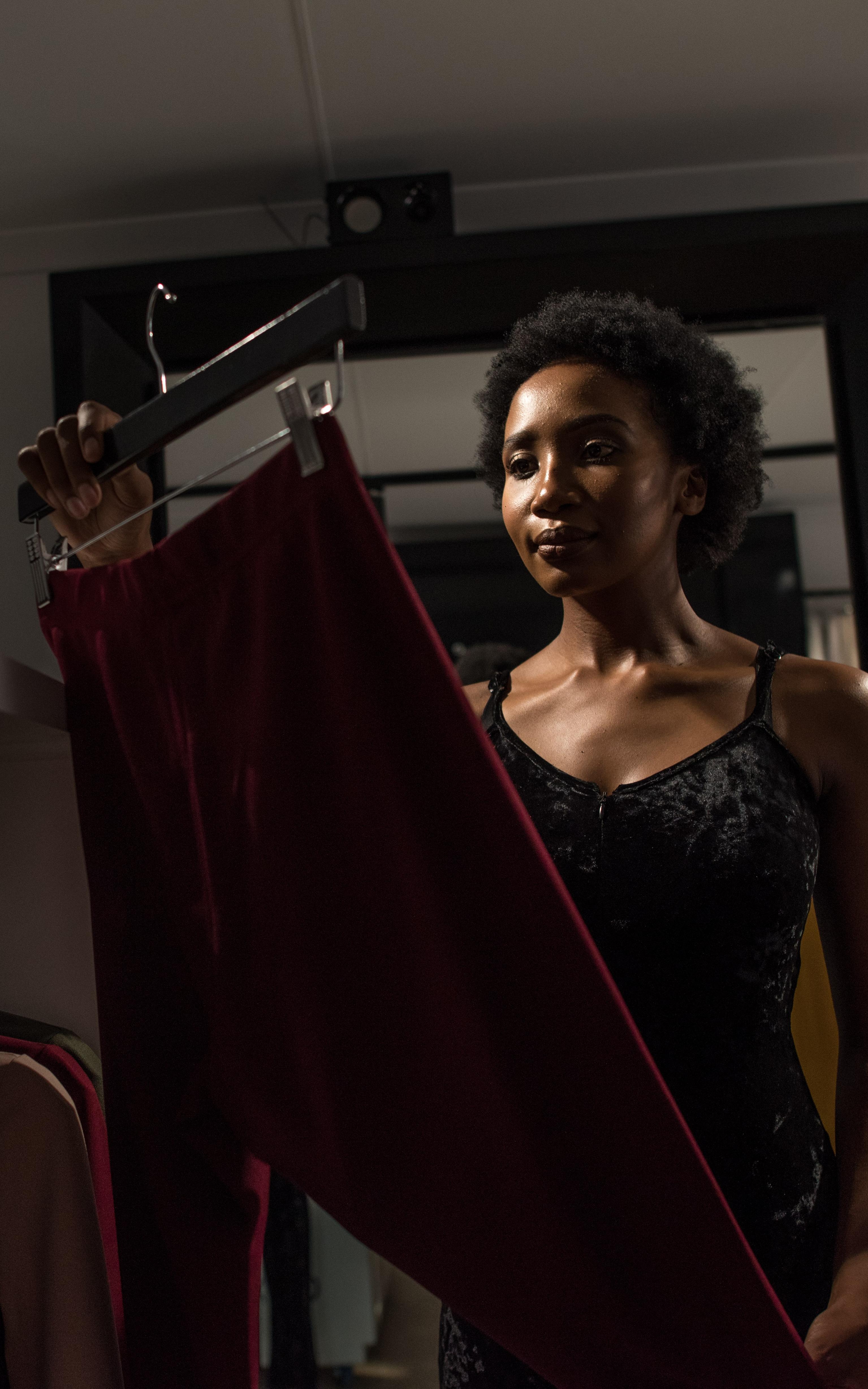 woman looking at clothes