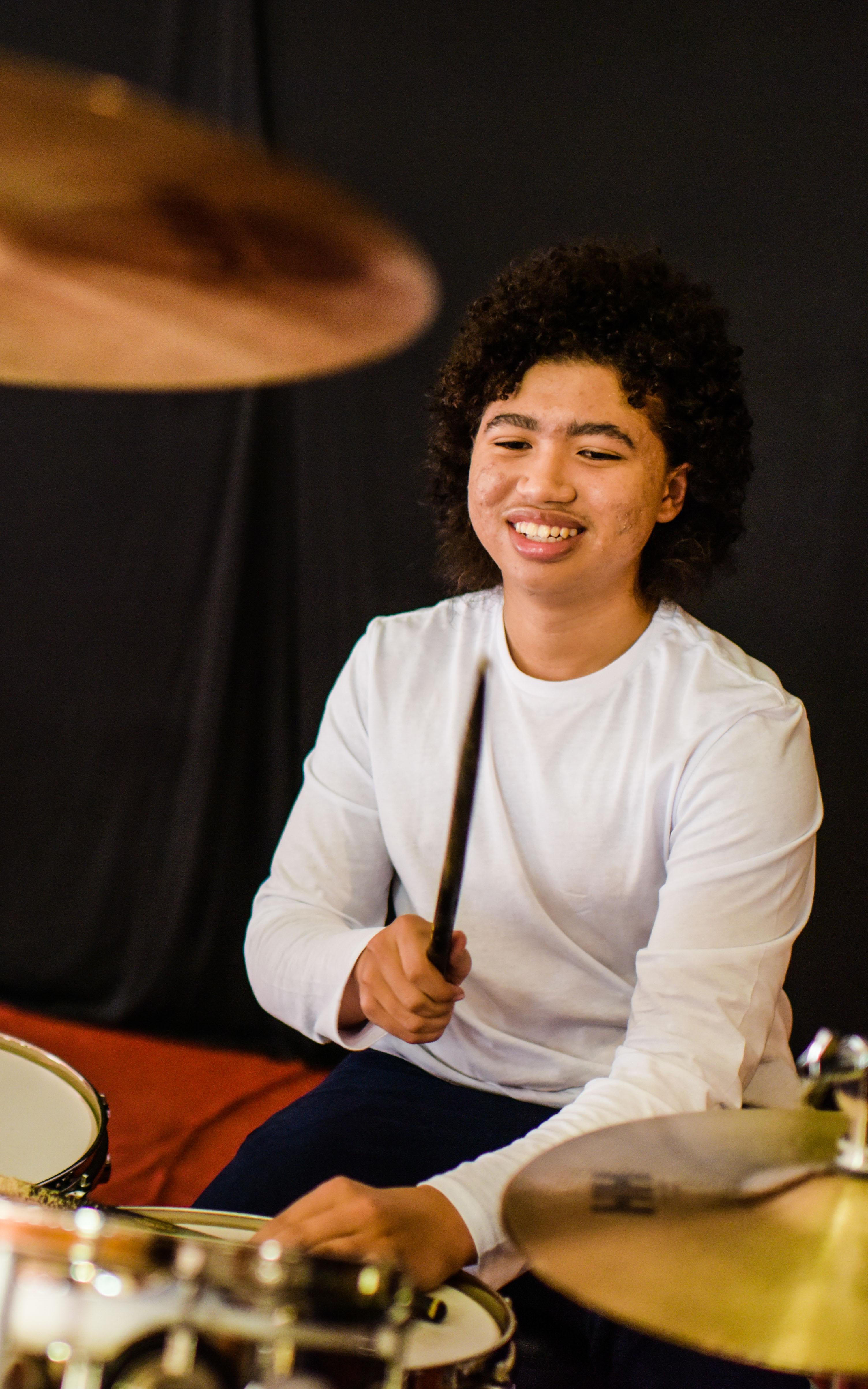 Boy playing drums