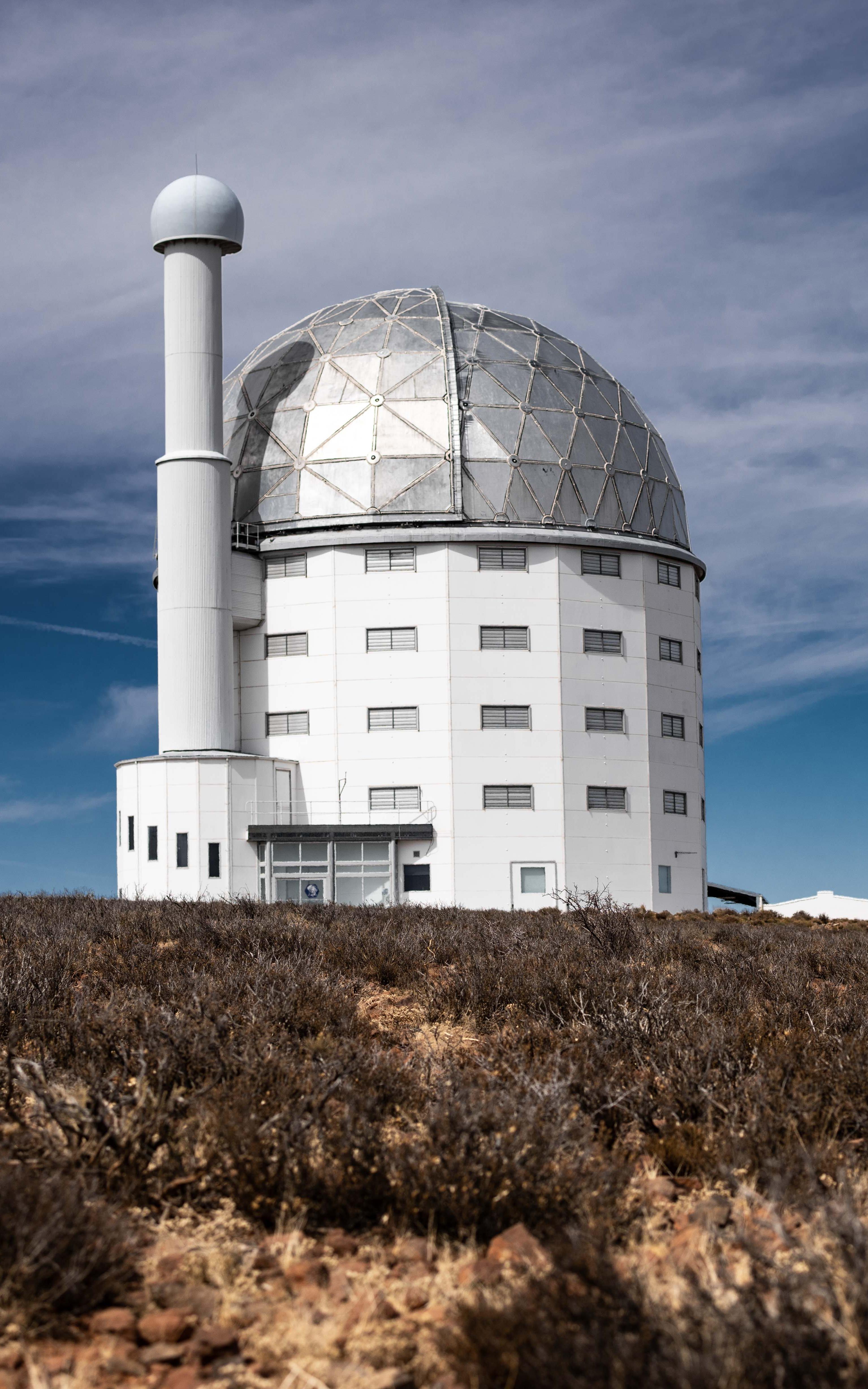 Travel to the desolate Karoo landscape and discover the town where science and tradition collide