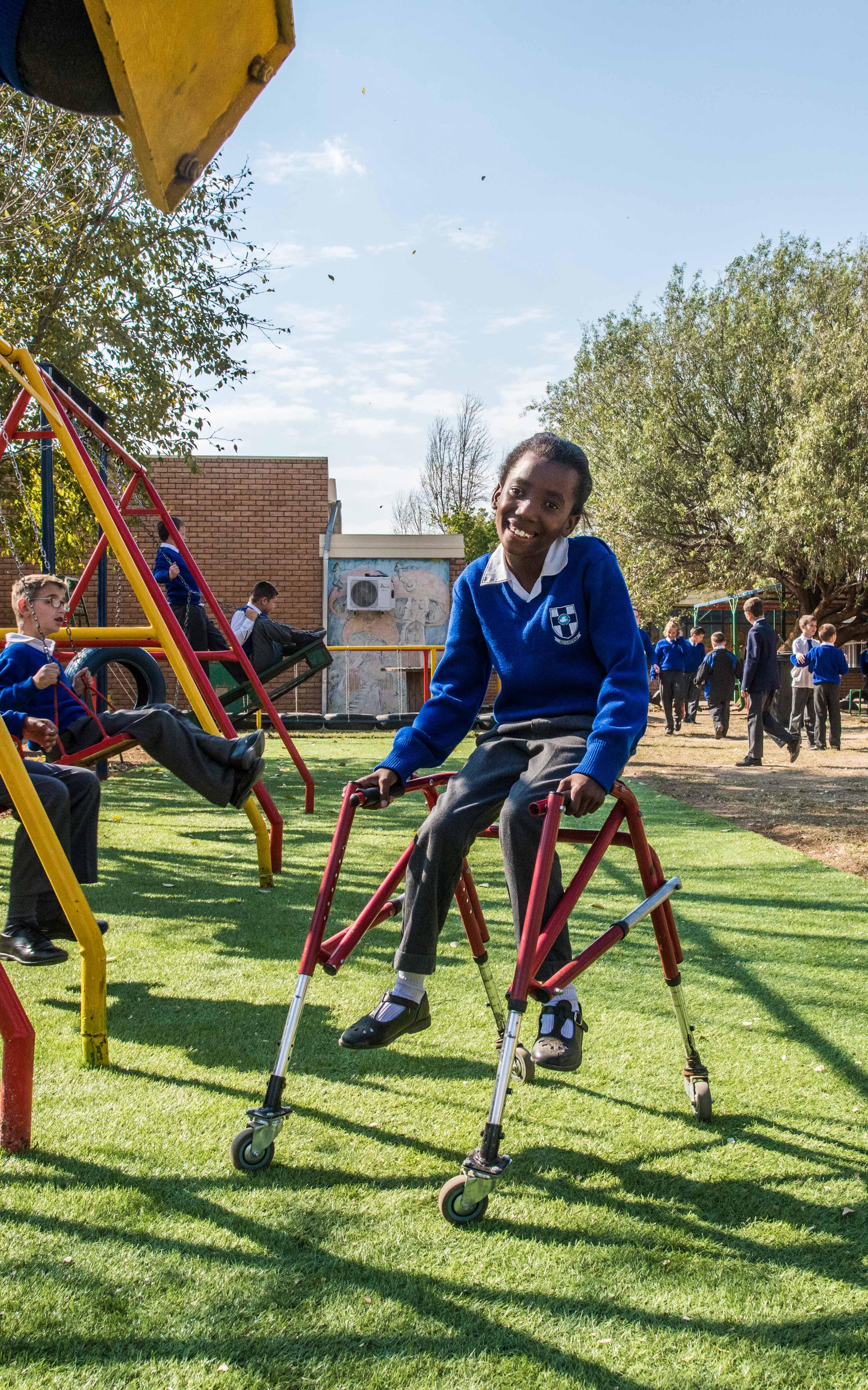 Kids, both abled and differently abled, playing