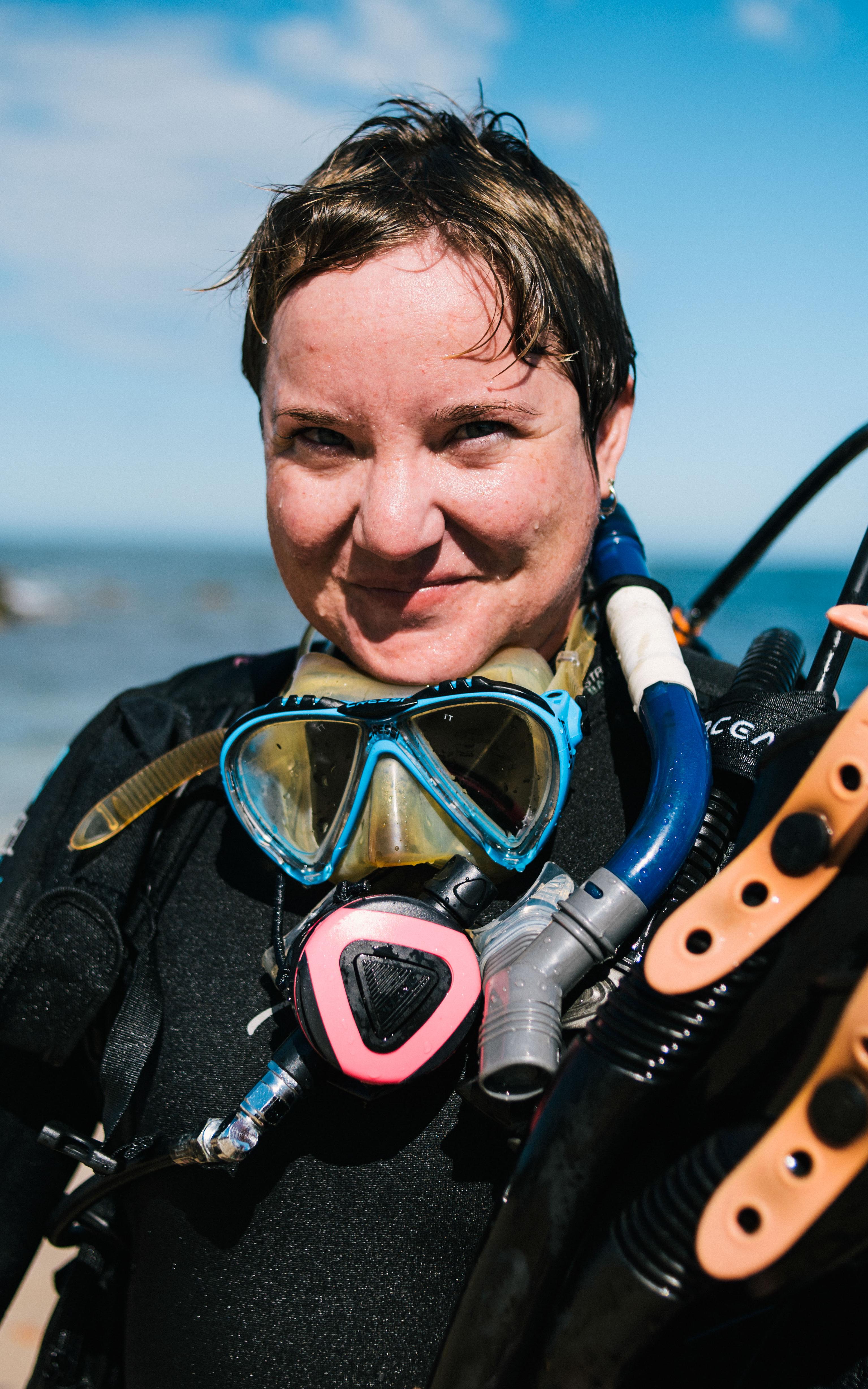 Woman in scuba gear.
