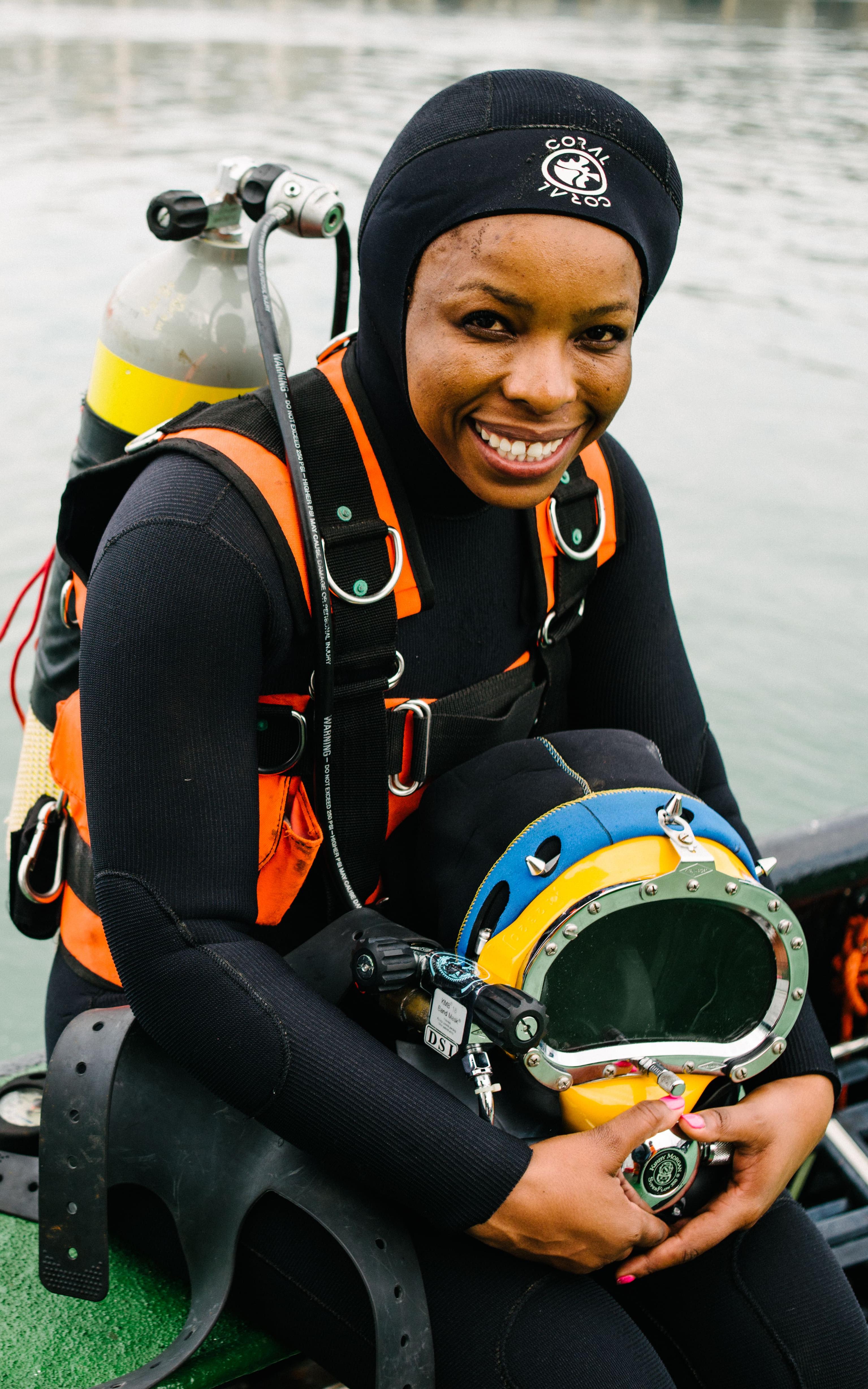 Woman in scuba gear.