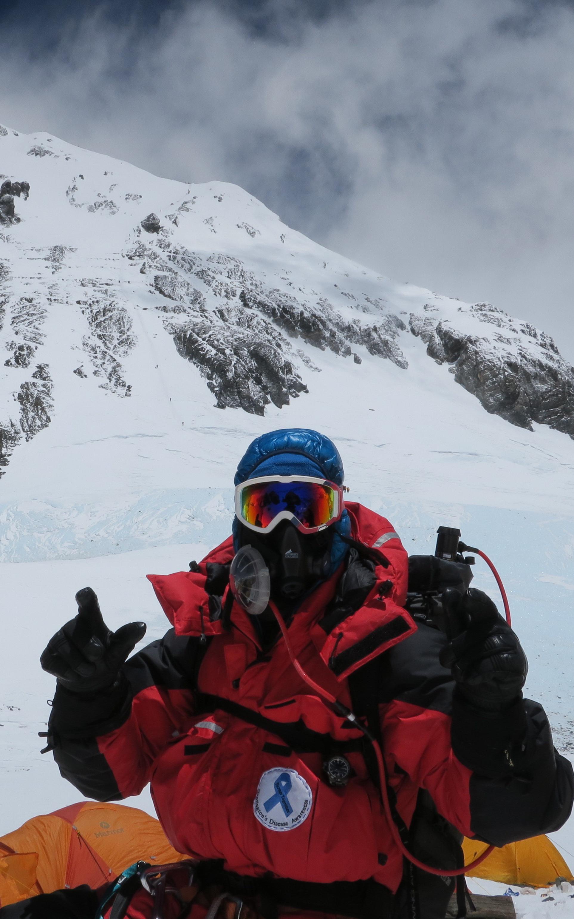 The youngest South African to summit Mount Everest is doing it all to fight the incurable disease devastating his family