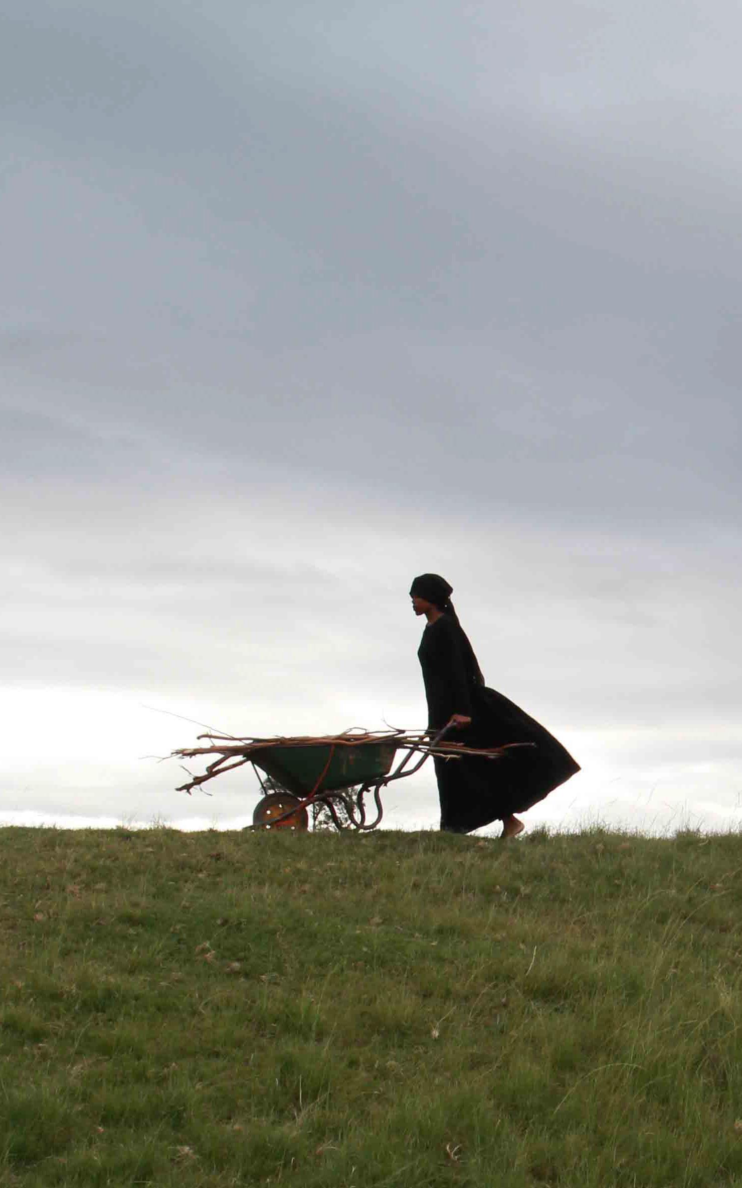 Woman with a wheelbarrow