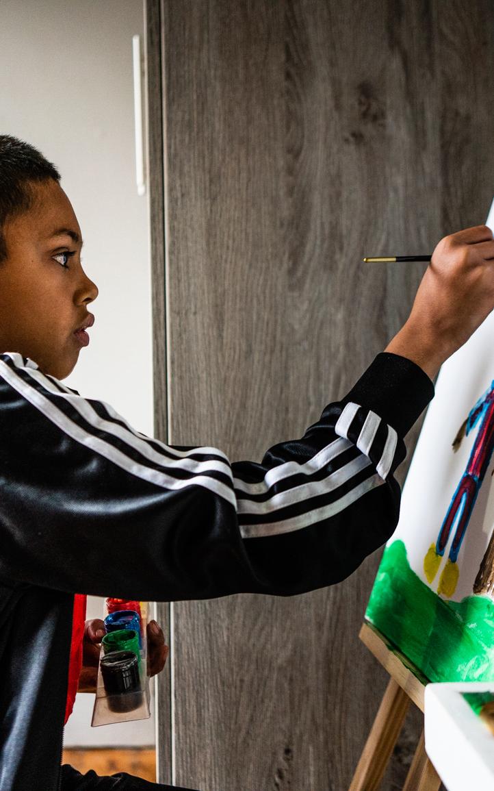 A boy with autism using art as form of expression and release.