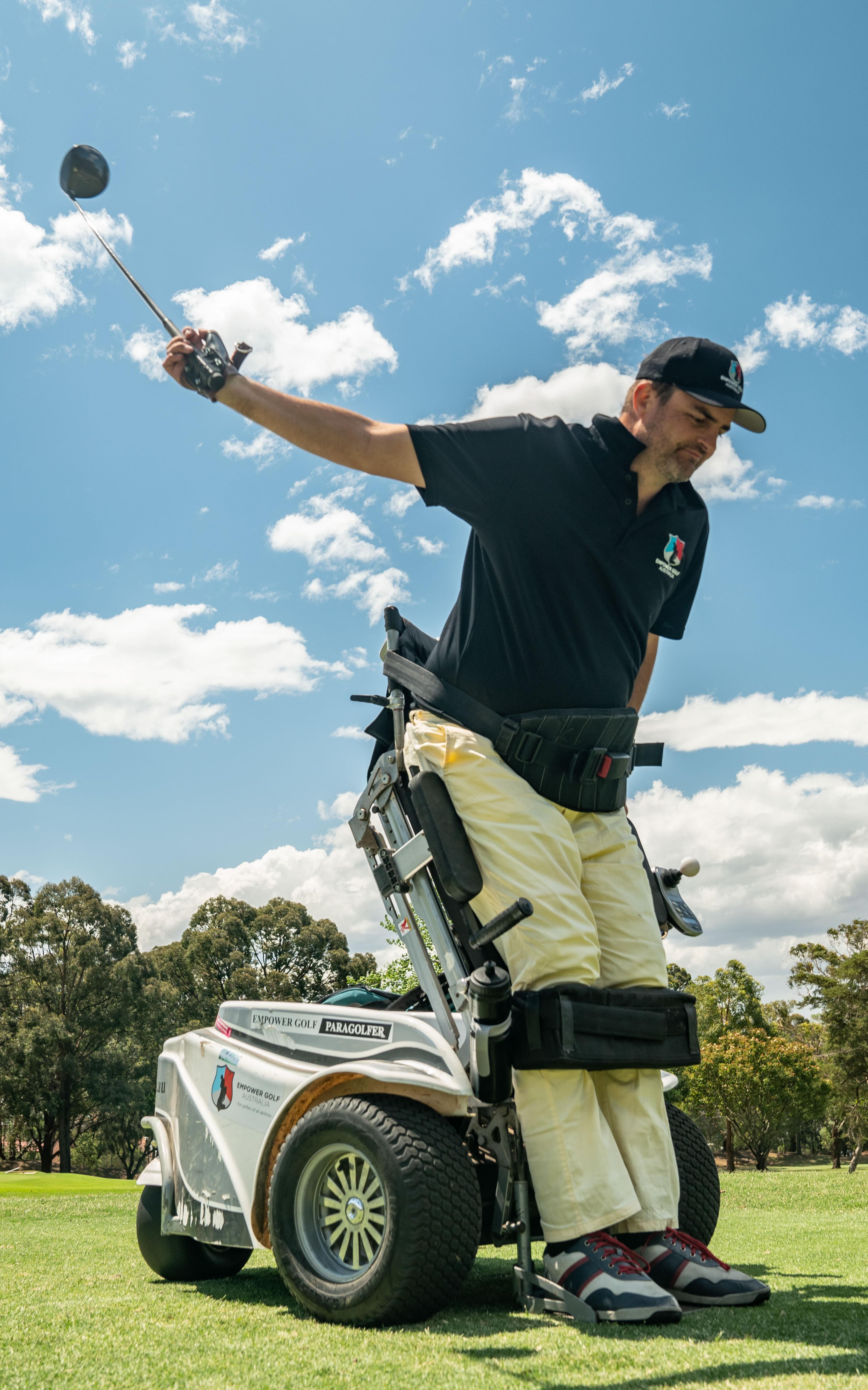 Disabled man playing golf. 