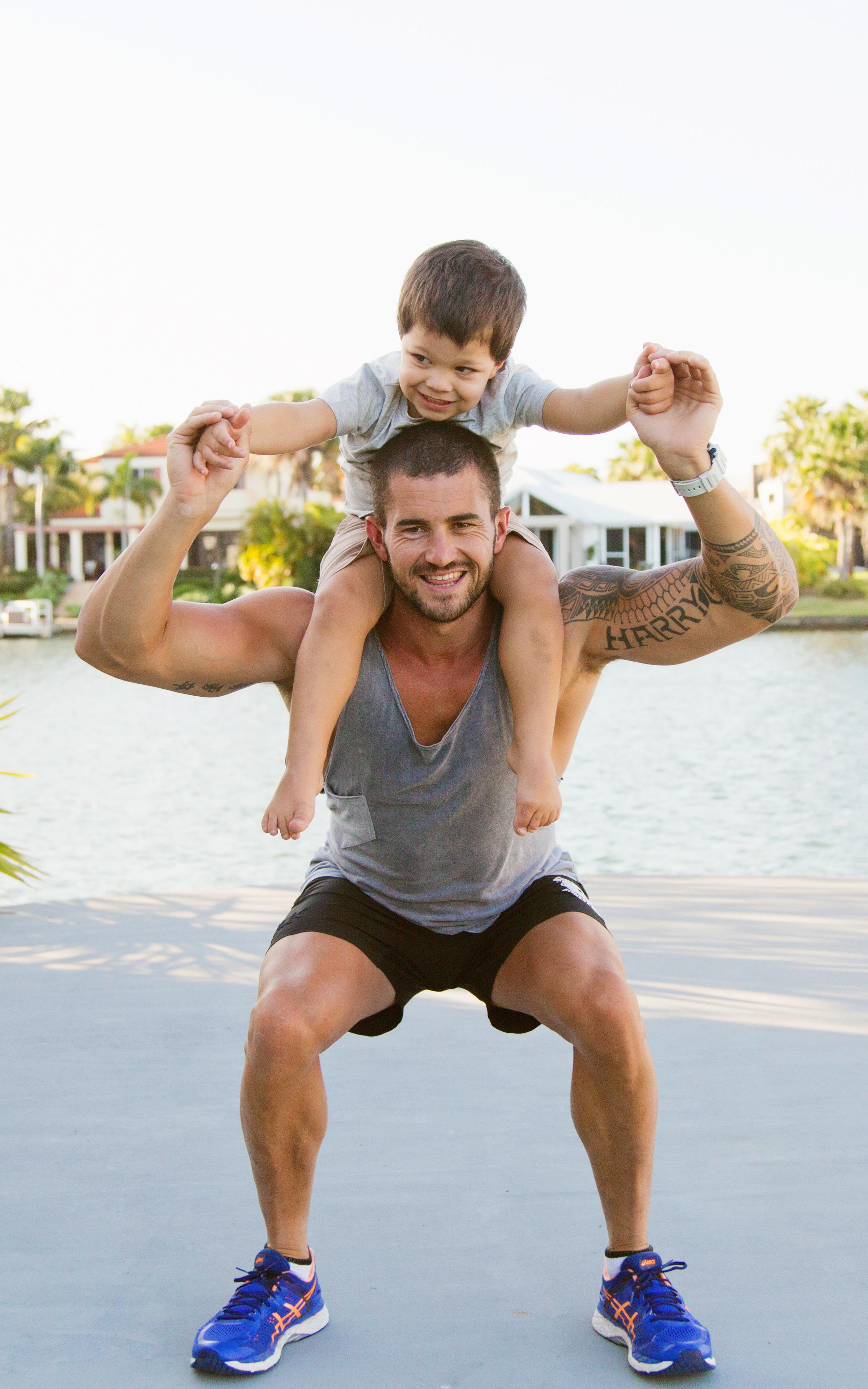 Beautiful News - Man with child on his shoulders