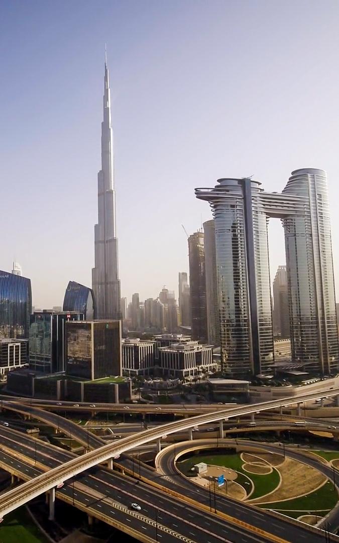Beautiful News - Image shows a bustling Dubai with roads and skyscrapers on full display