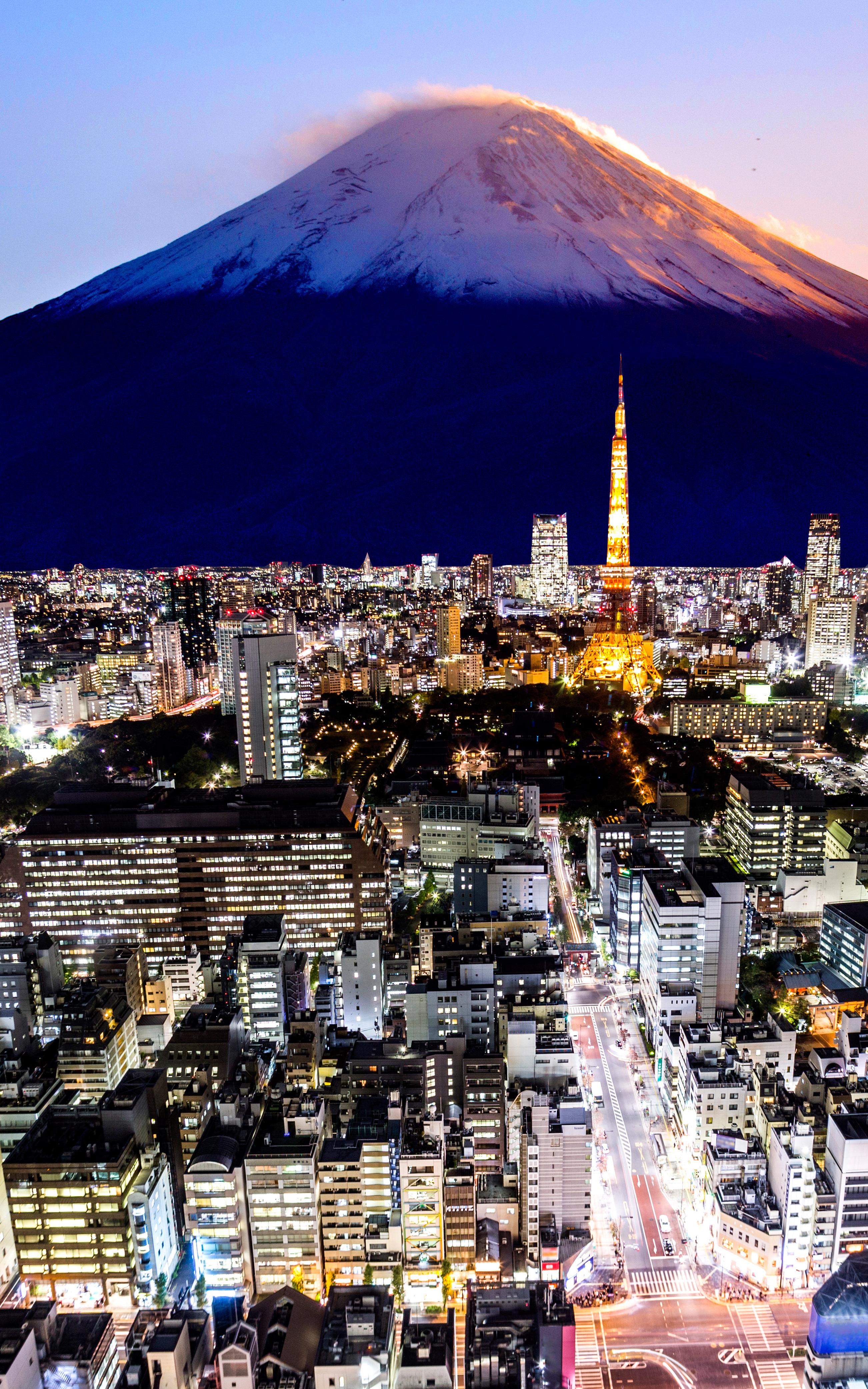 Beautiful News - Aerial shot of Tokyo Japan at night, building and skyscrapers with lights fill the skyline