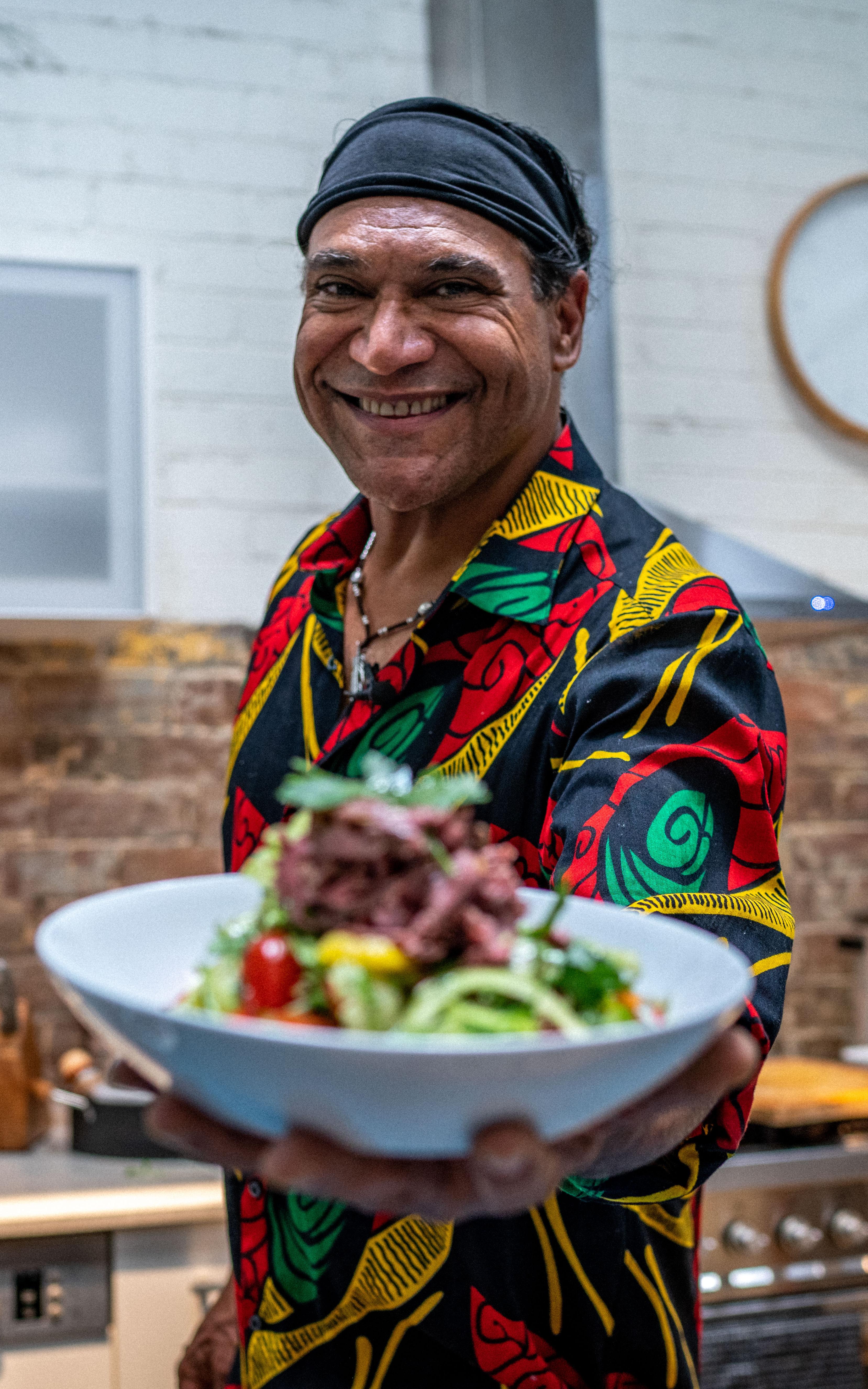 man with bowl of food