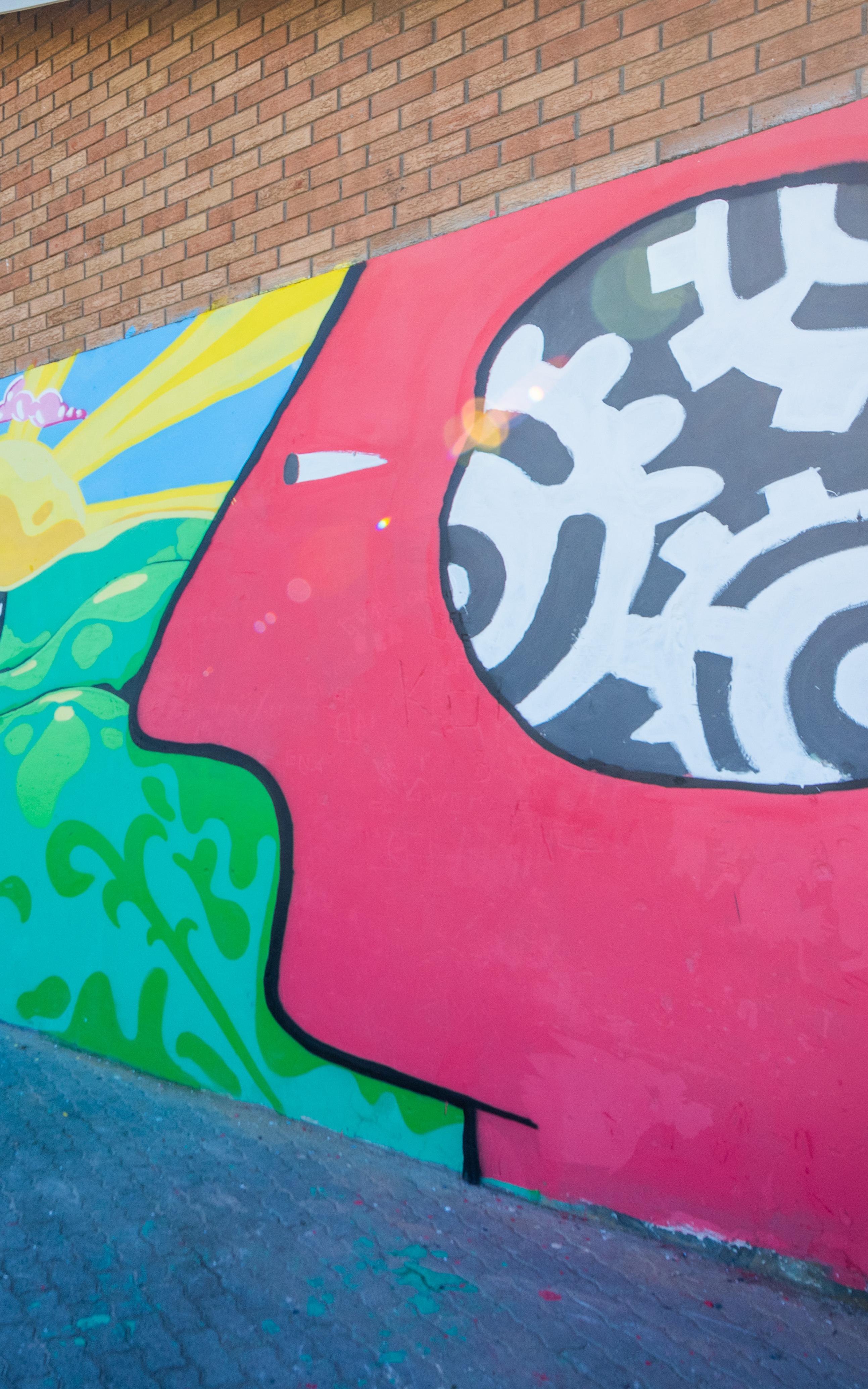 painting on the wall, mind bending to reality , and the road toad.