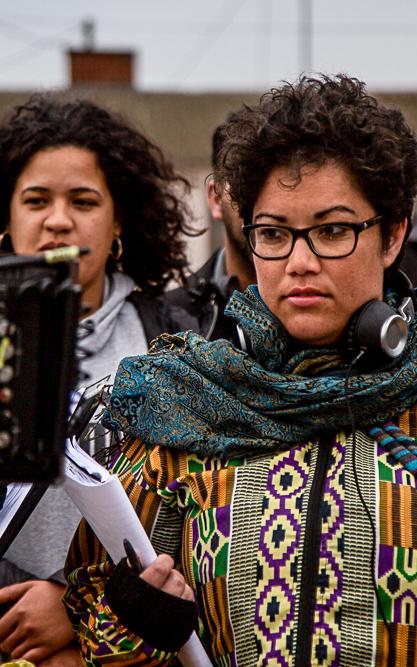 Female director holding a script.