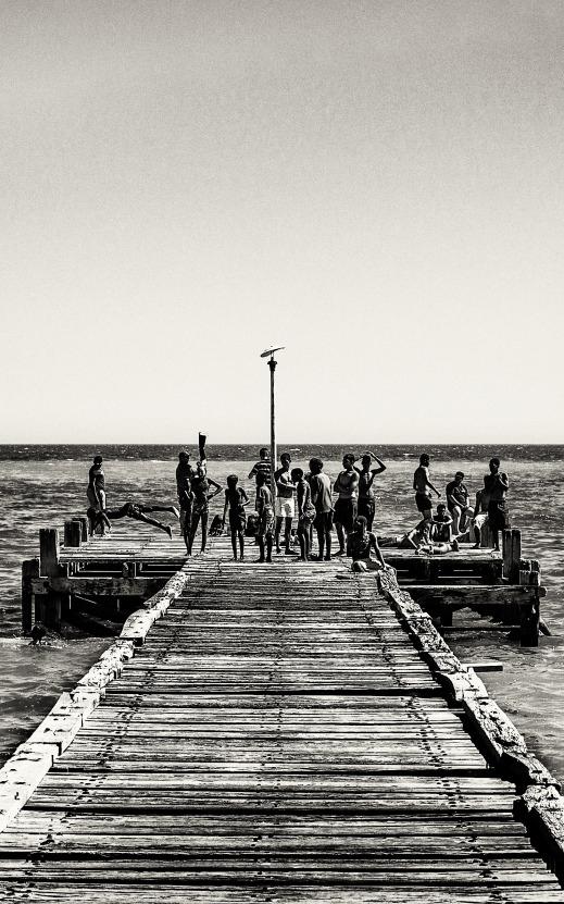 Children on bridge at beach