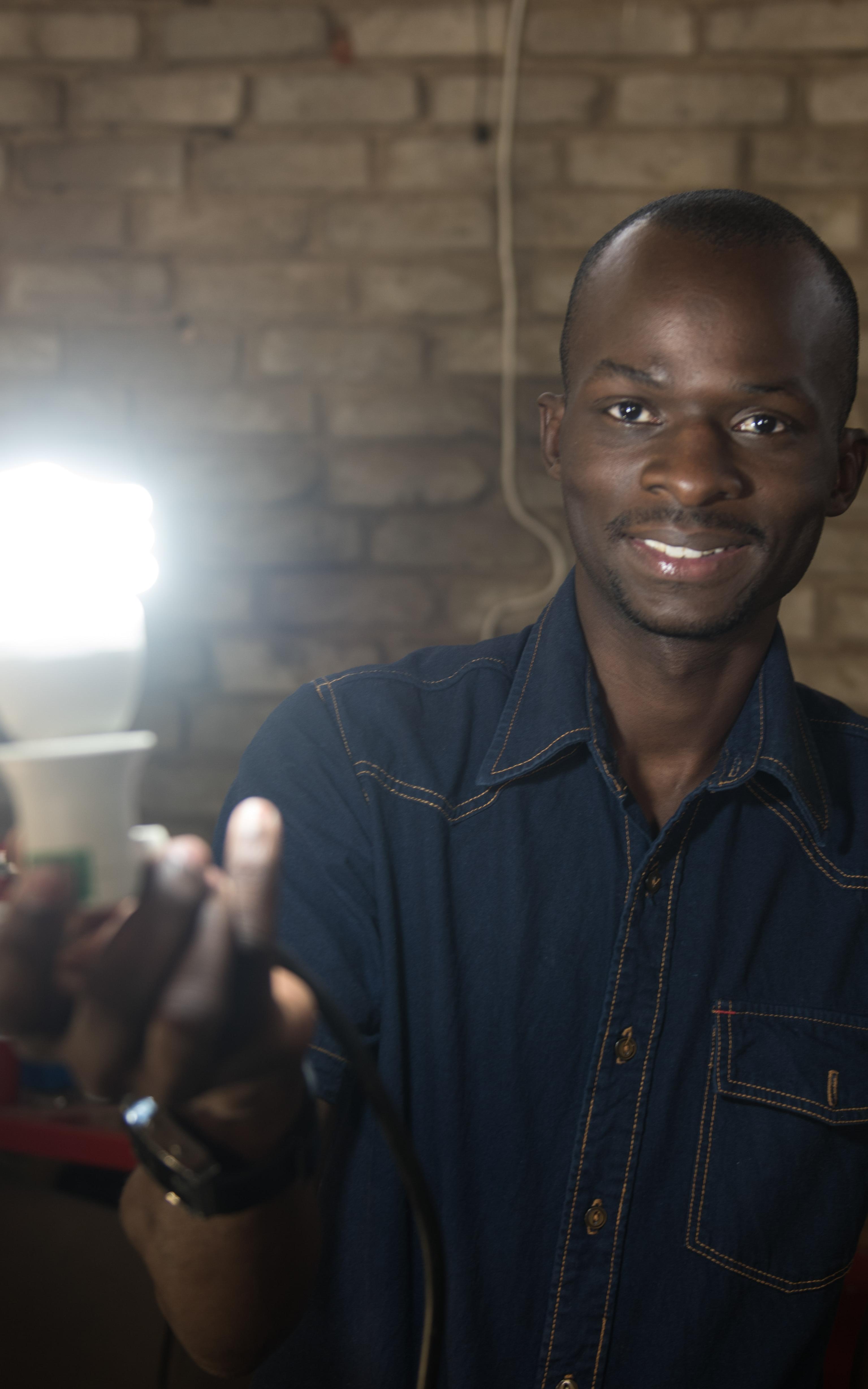 Inventor holding light