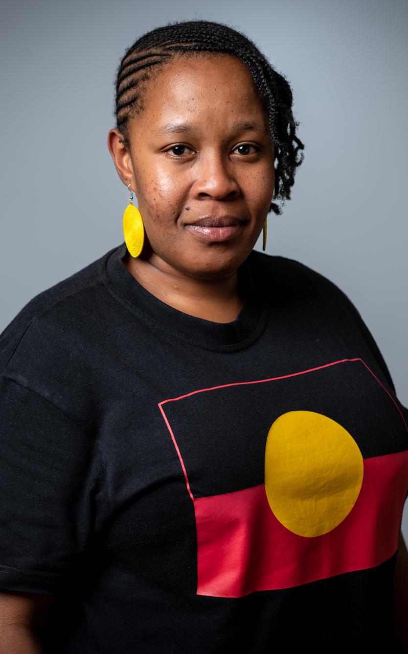 Black woman facing camera