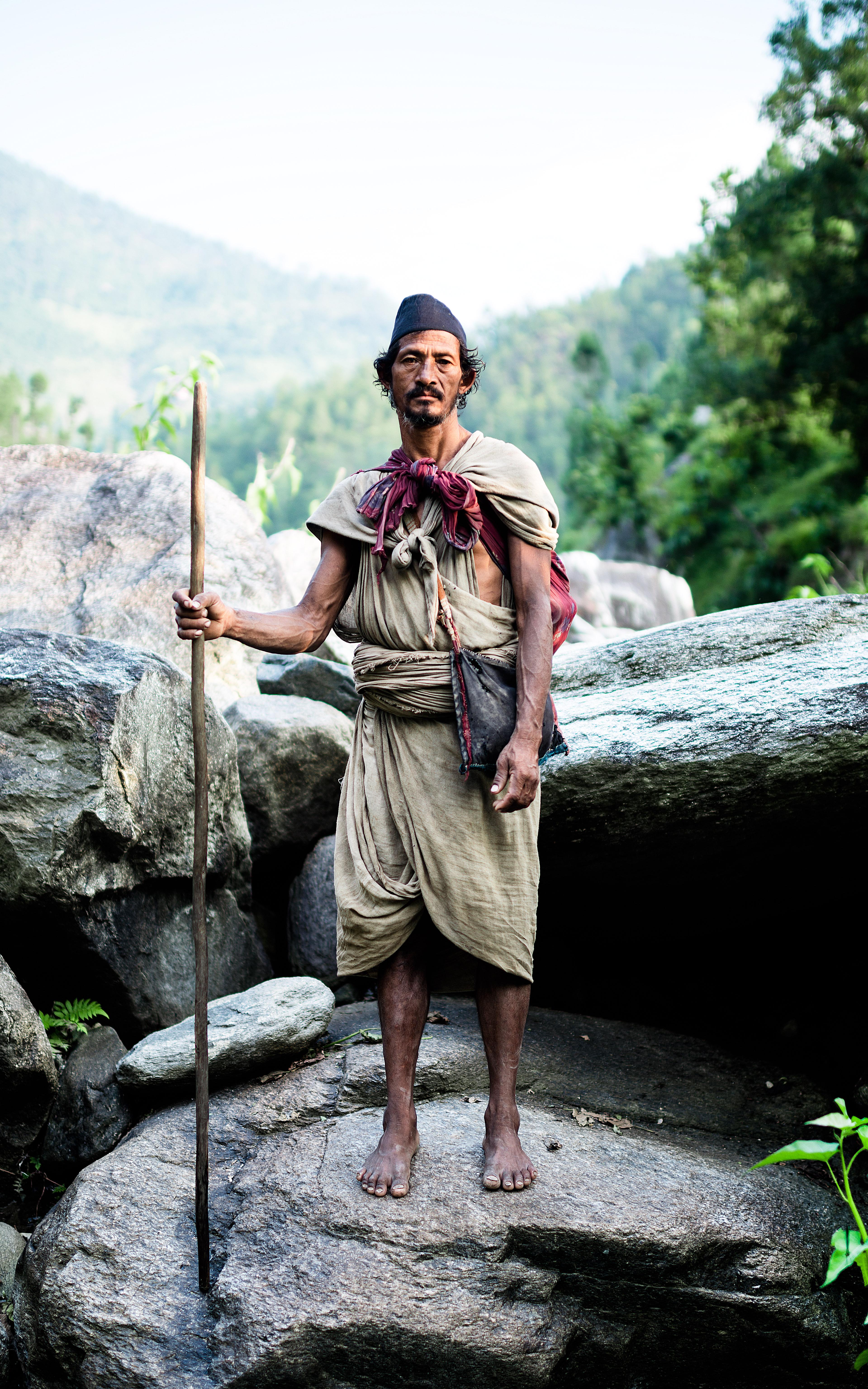 Man with stick. 