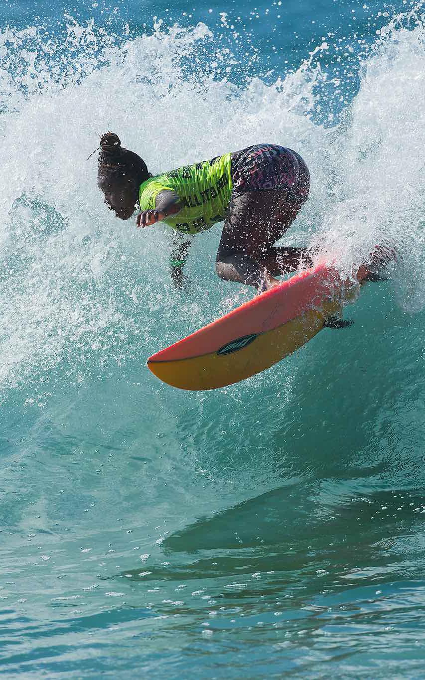 Young female surfing