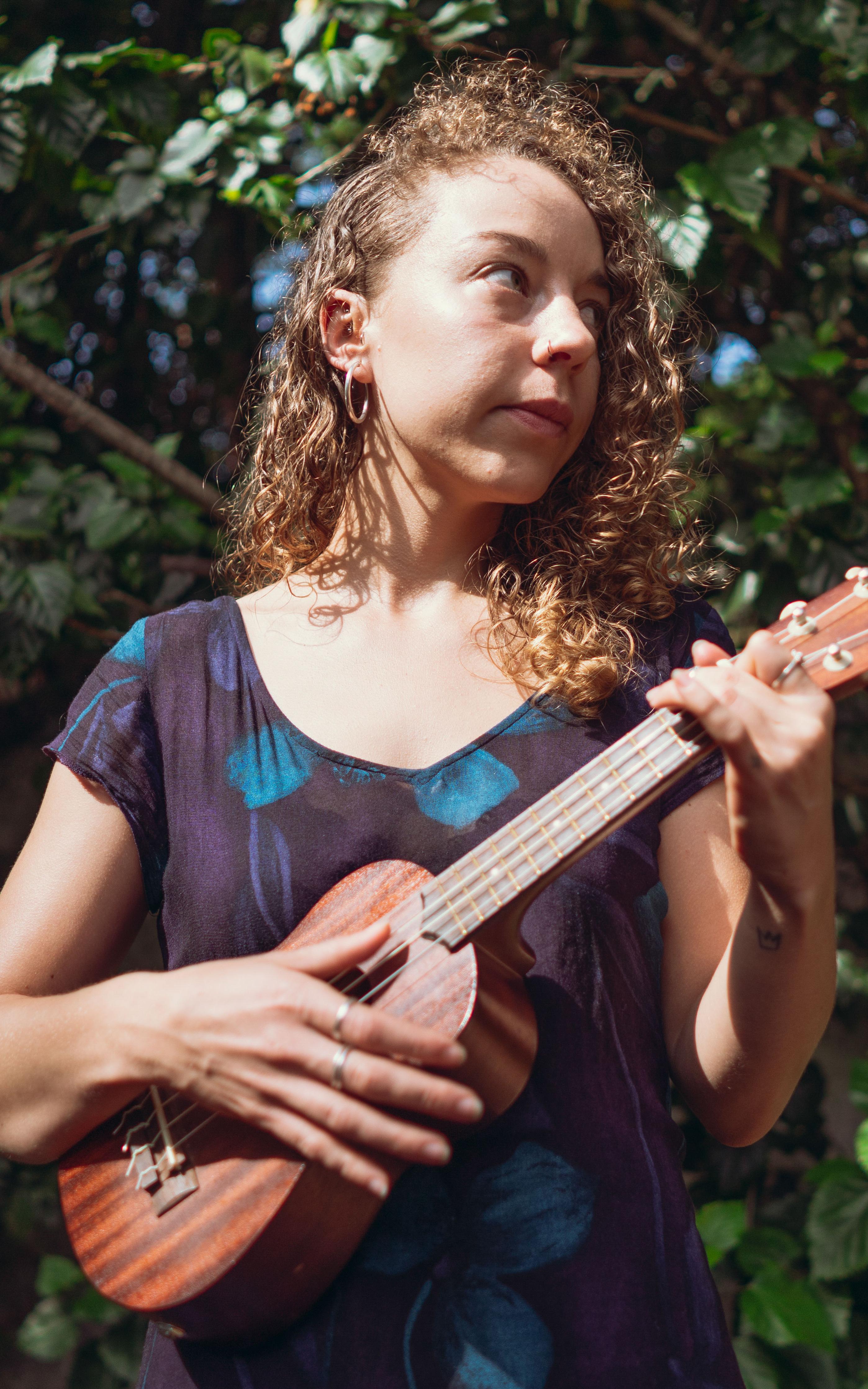 Woman with ukulele.  