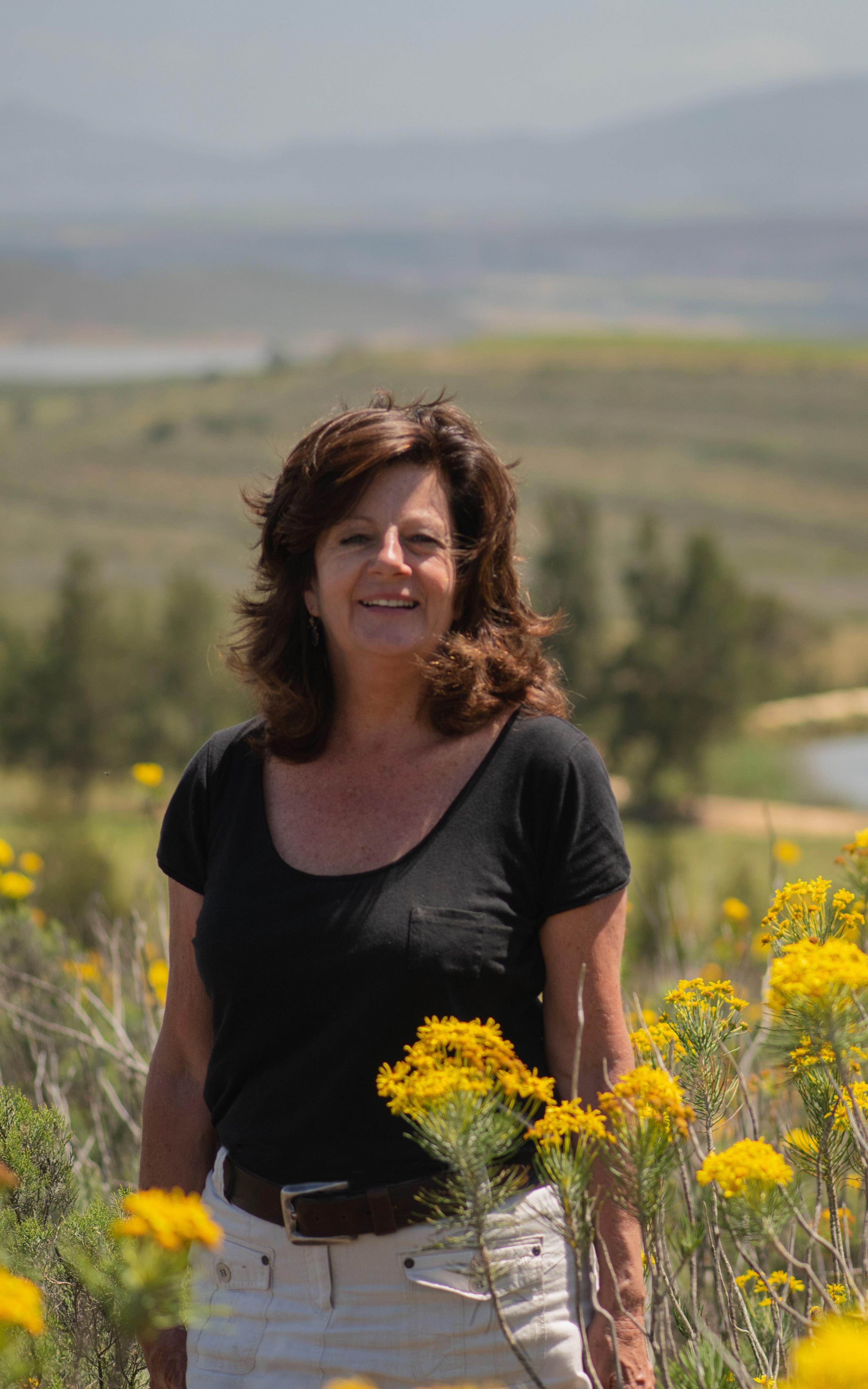 Woman in field of flowers