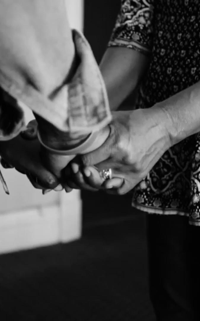 Beautiful News-Black and white image of holding hands