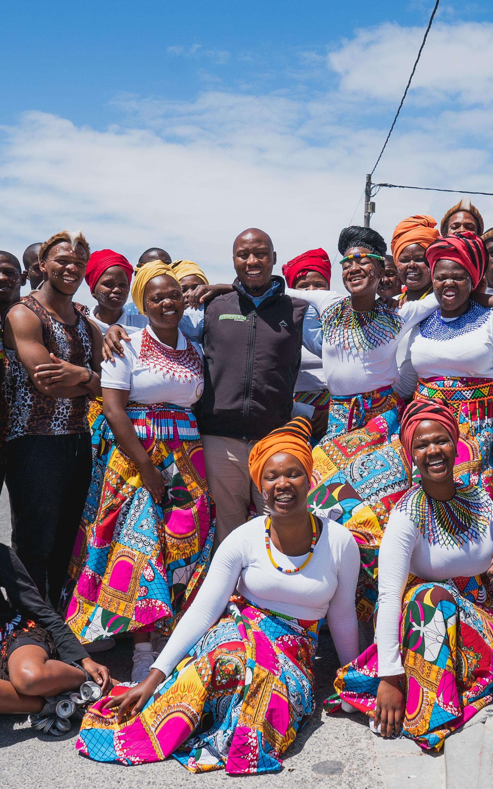 Group of black South Africans in traditional wear.