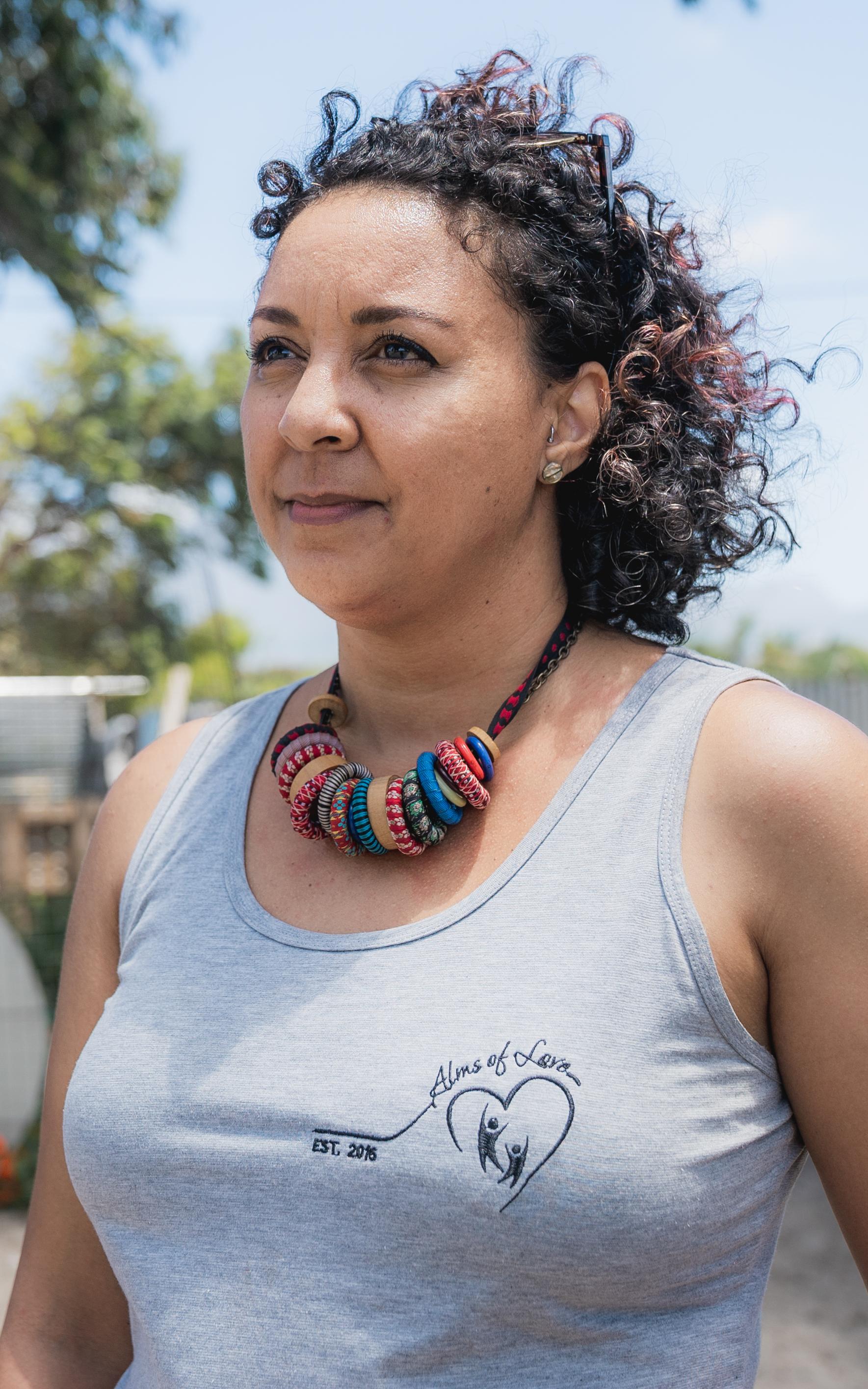 Coloured woman outside.