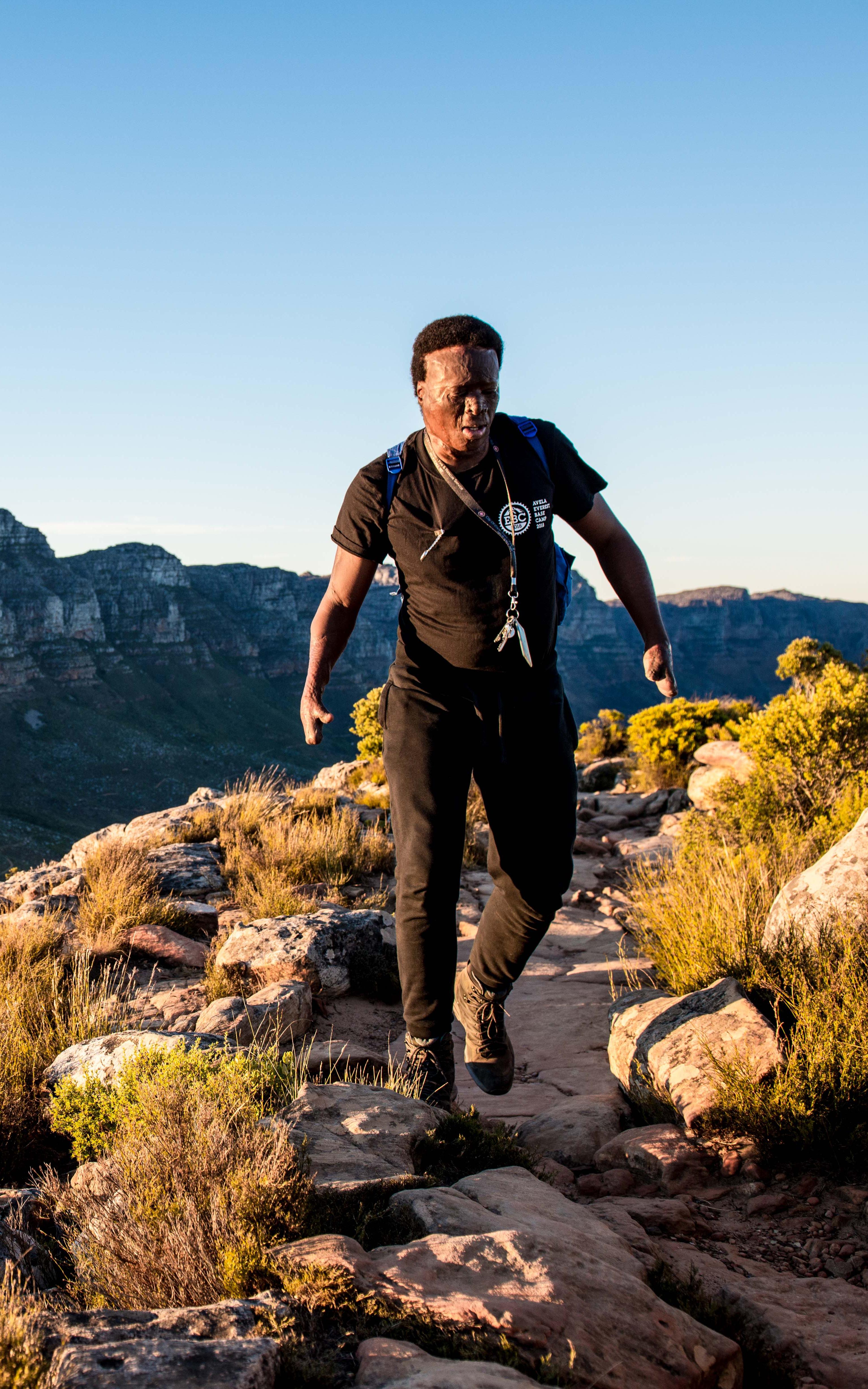 Man hiking up mountain