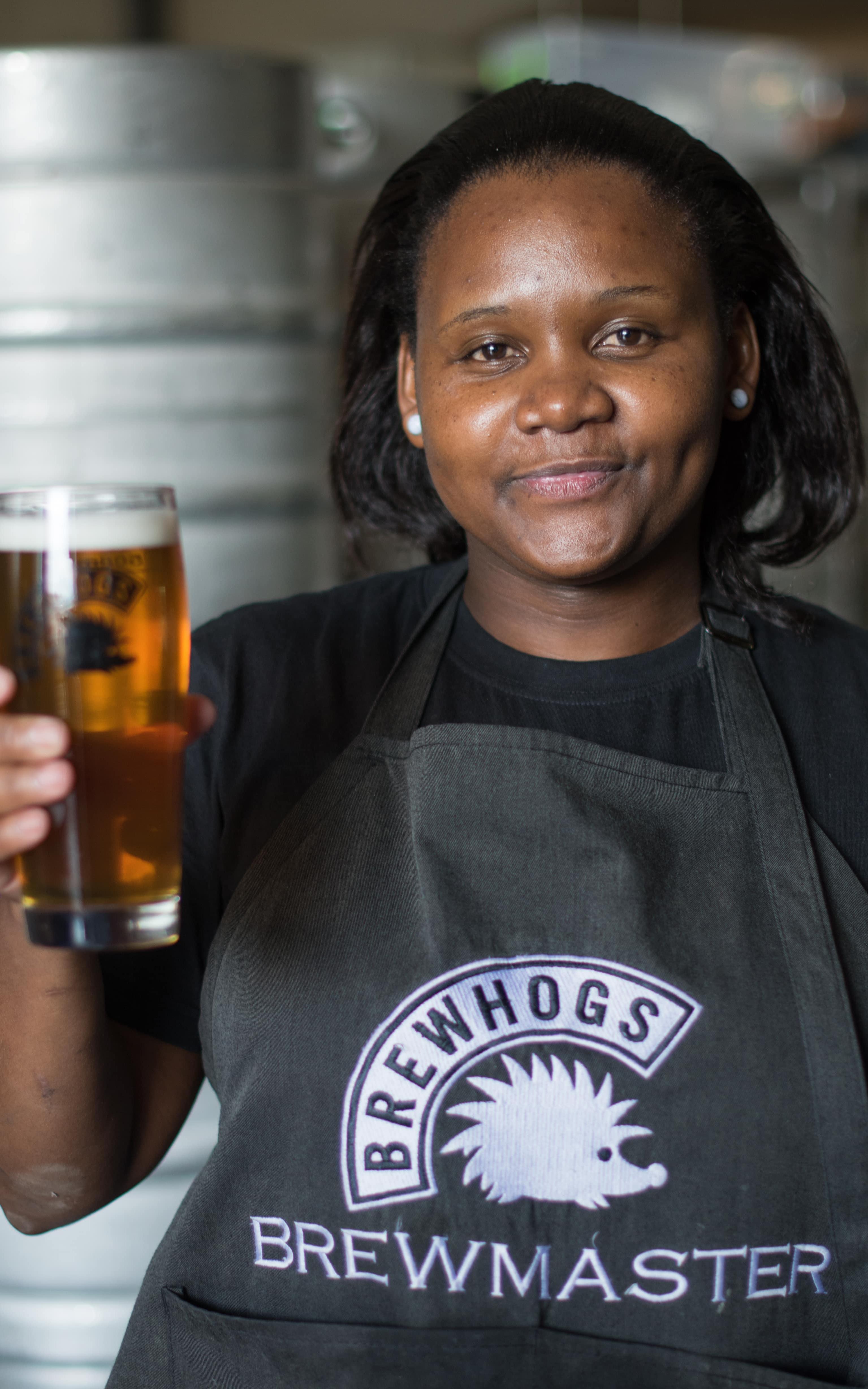 Woman holding a beer
