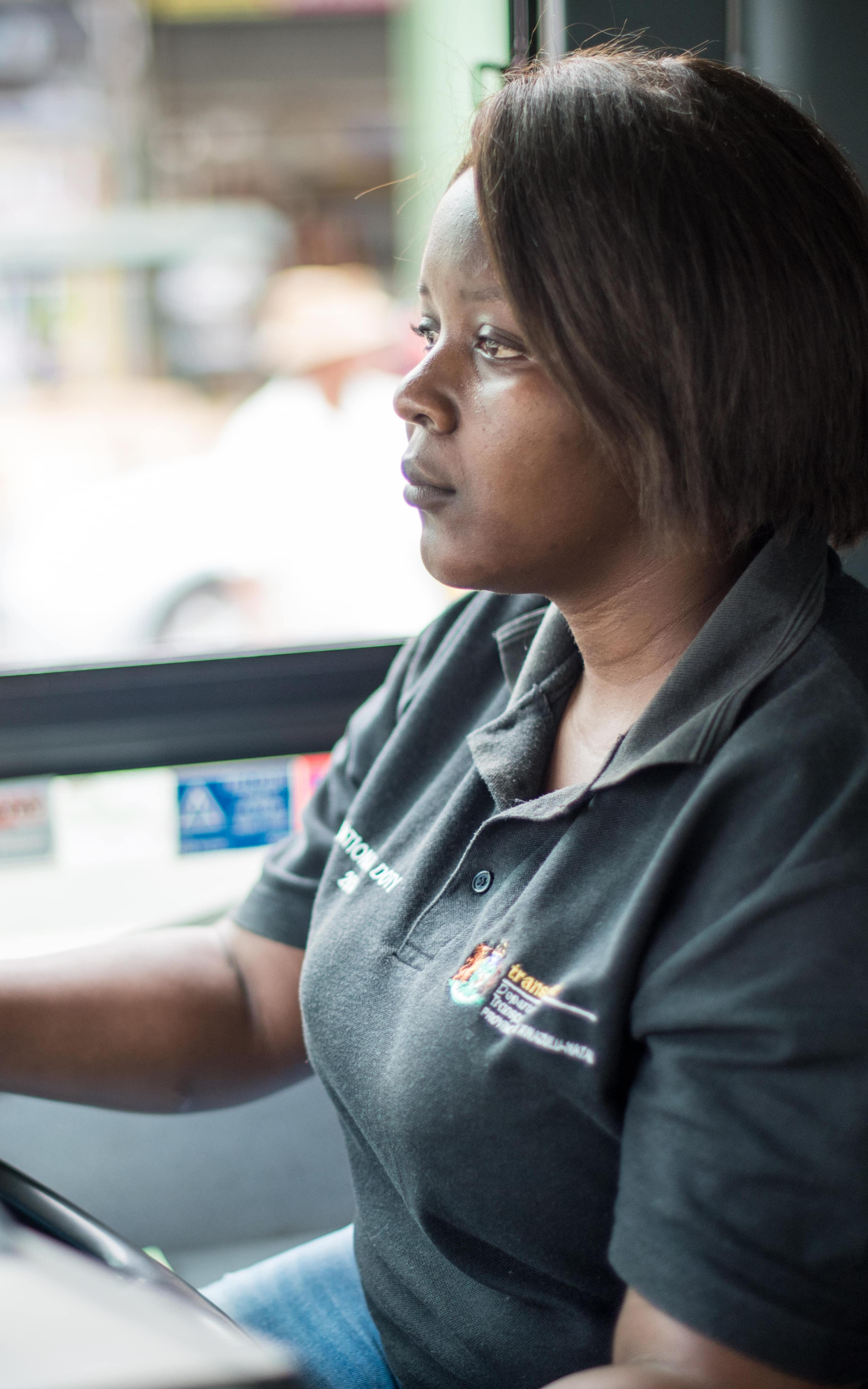 Woman driving a bus