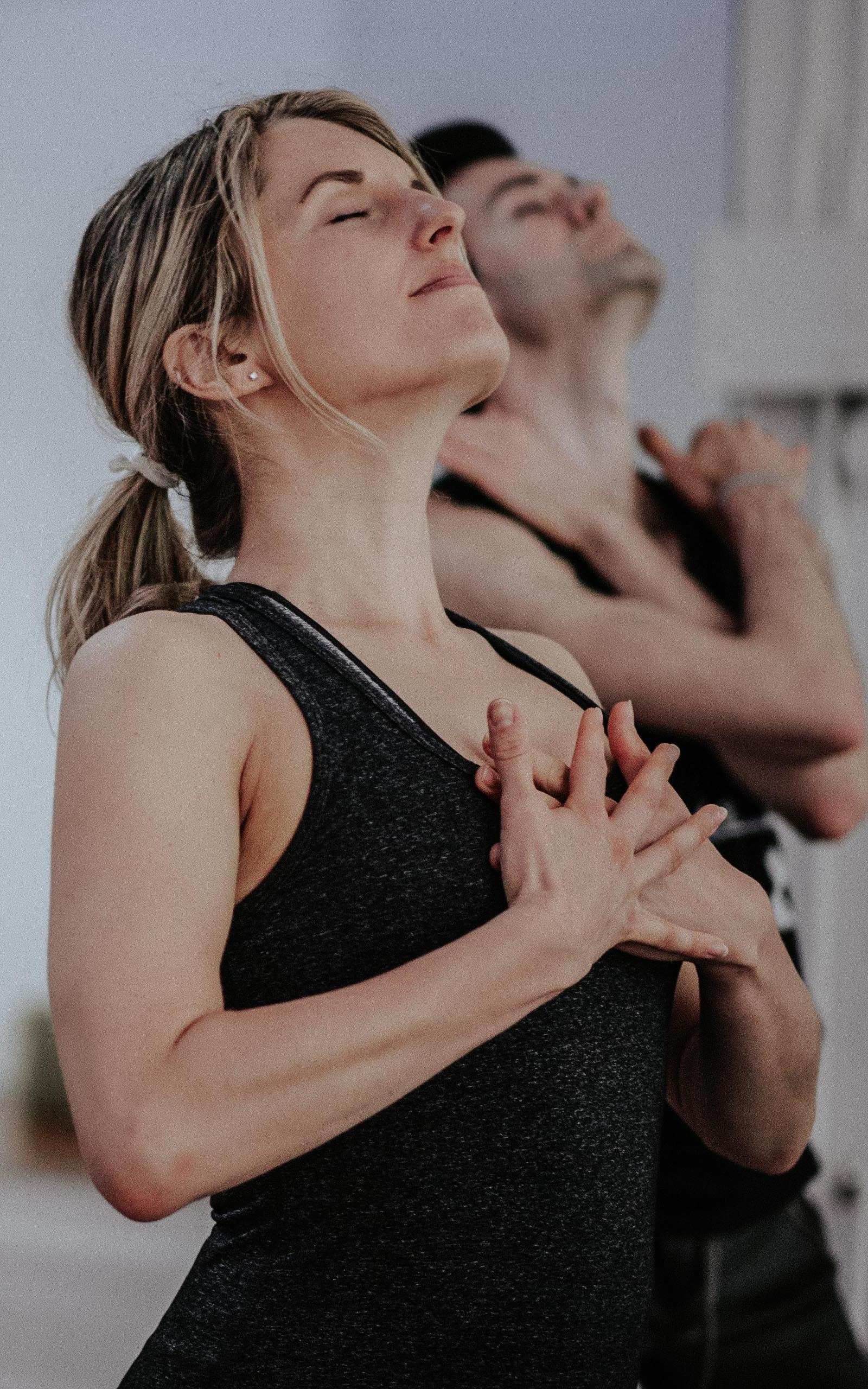 People doing yoga.