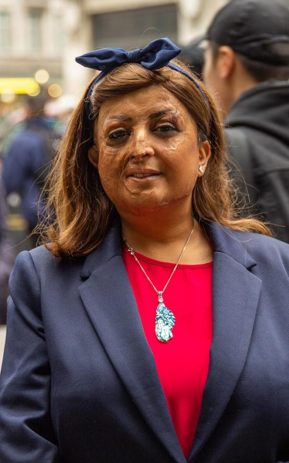 Beautiful News - Tulsi Vagjiani stands proudly on a busy sidewalk