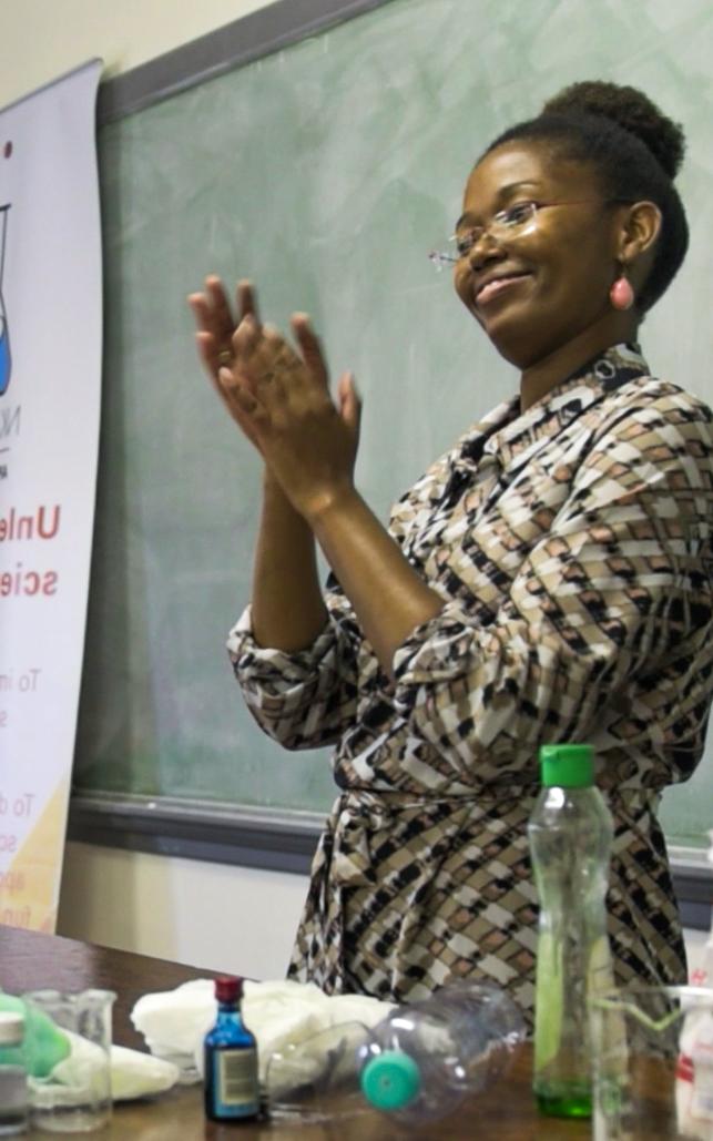 teacher smiling at class